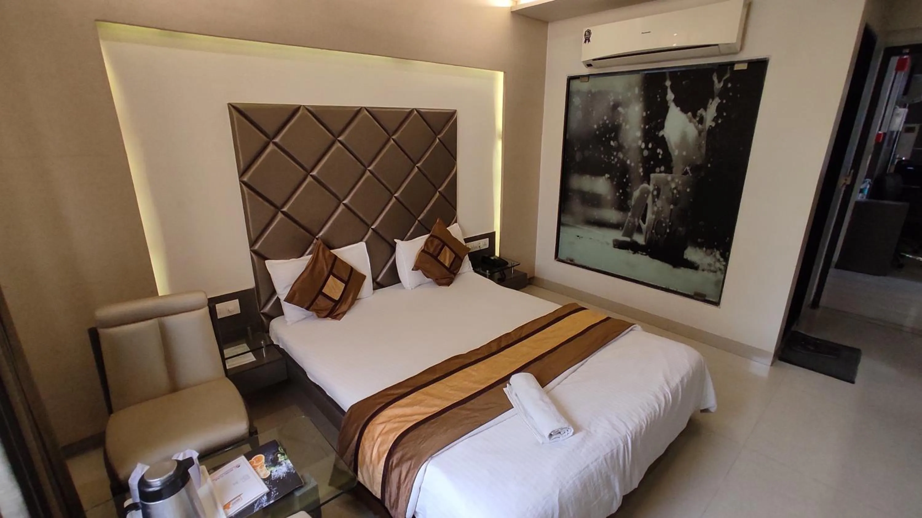 Bed in Hotel Flair Inn