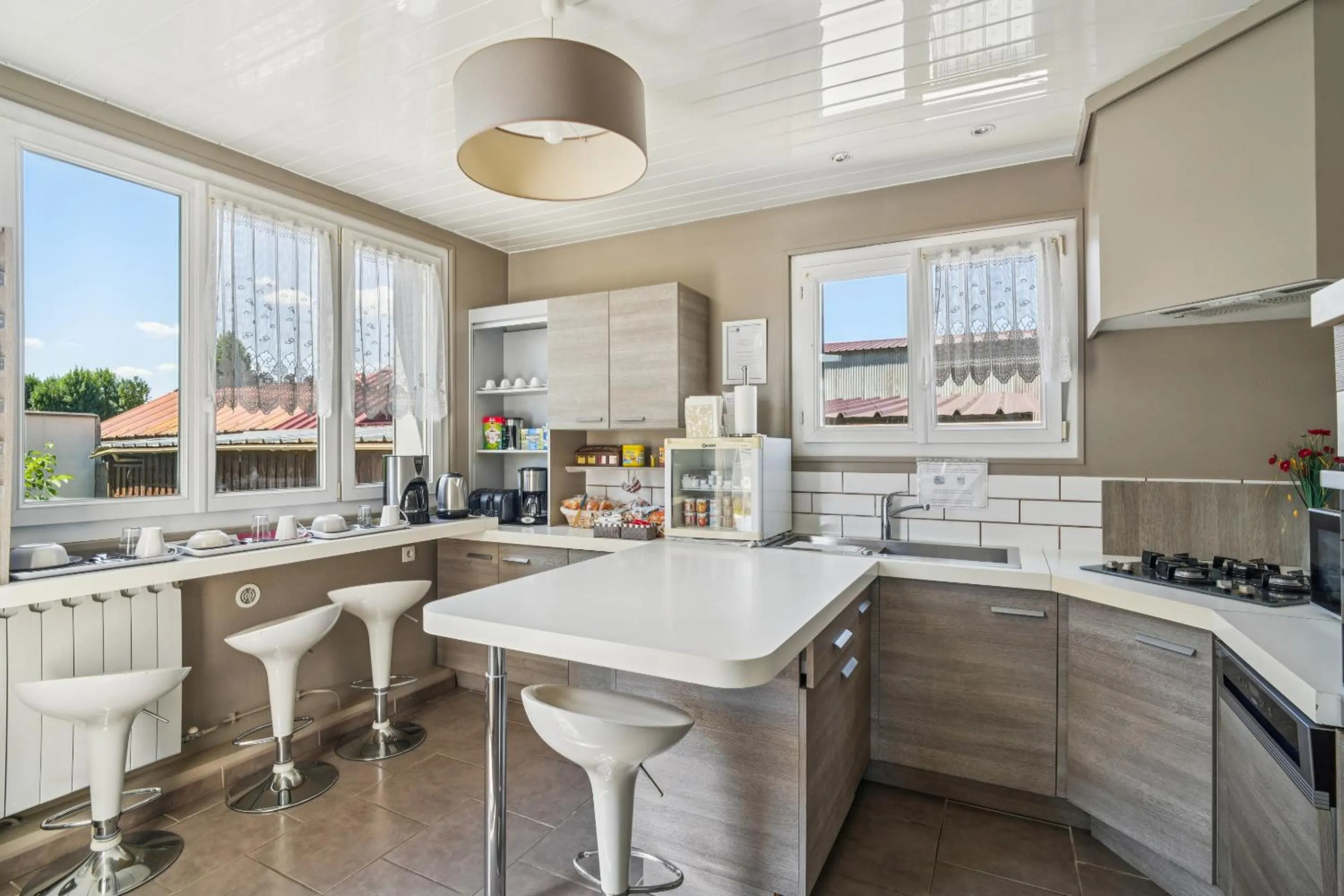 Kitchen or kitchenette in Roissy Chambres