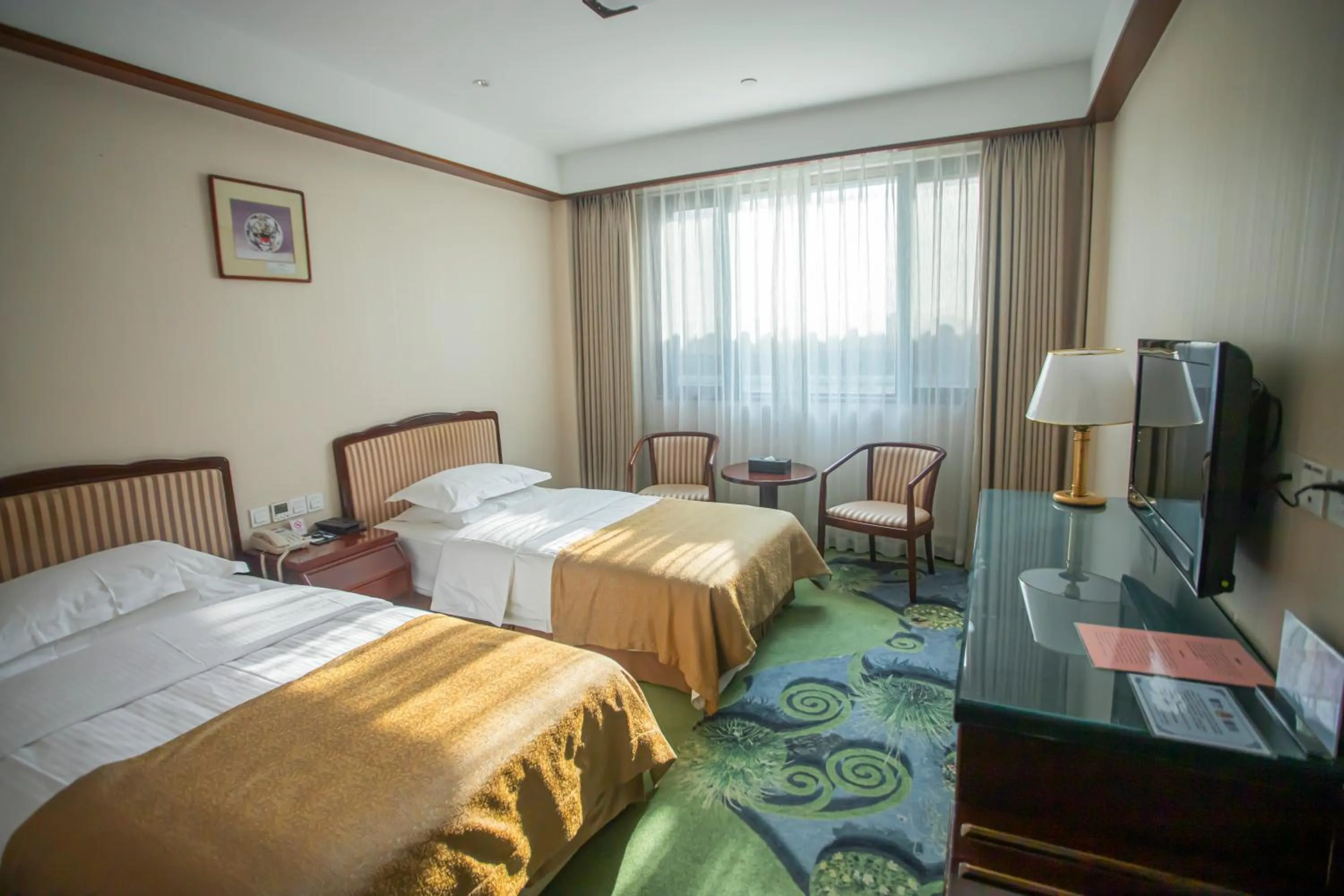 Photo of the whole room, Bed in Jade Garden Hotel