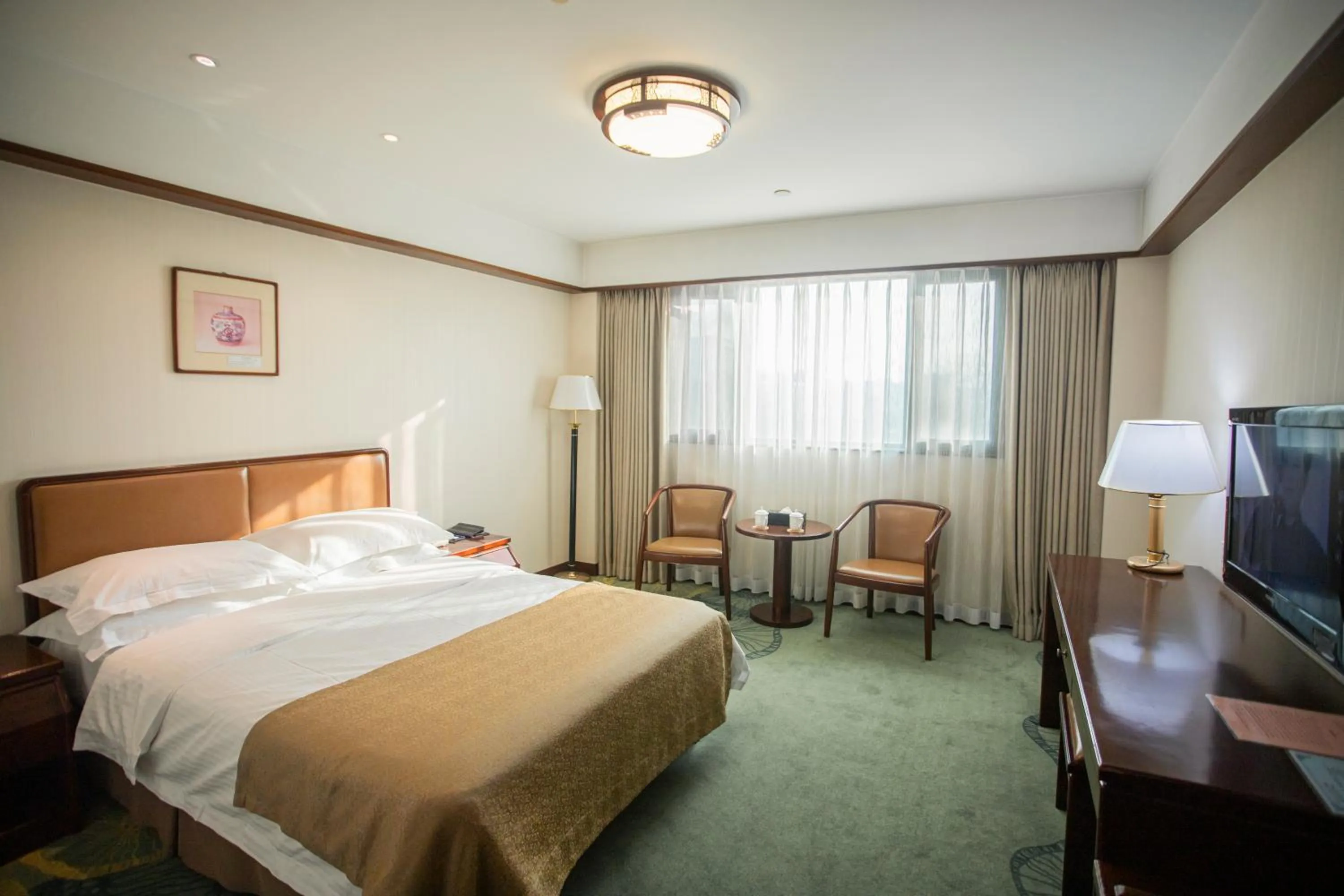 Photo of the whole room, Bed in Jade Garden Hotel