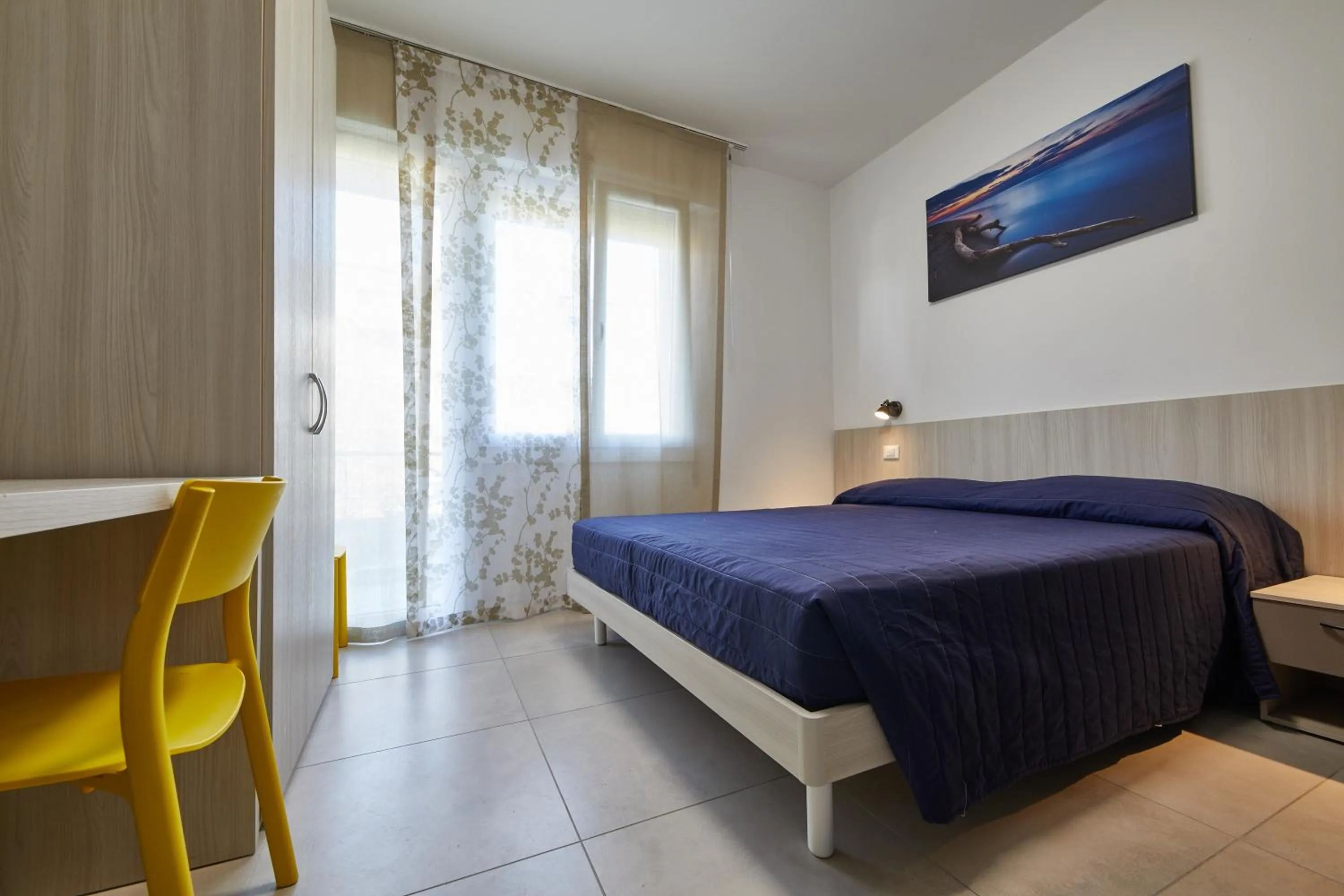 Bed in Lilium Maris Hotel