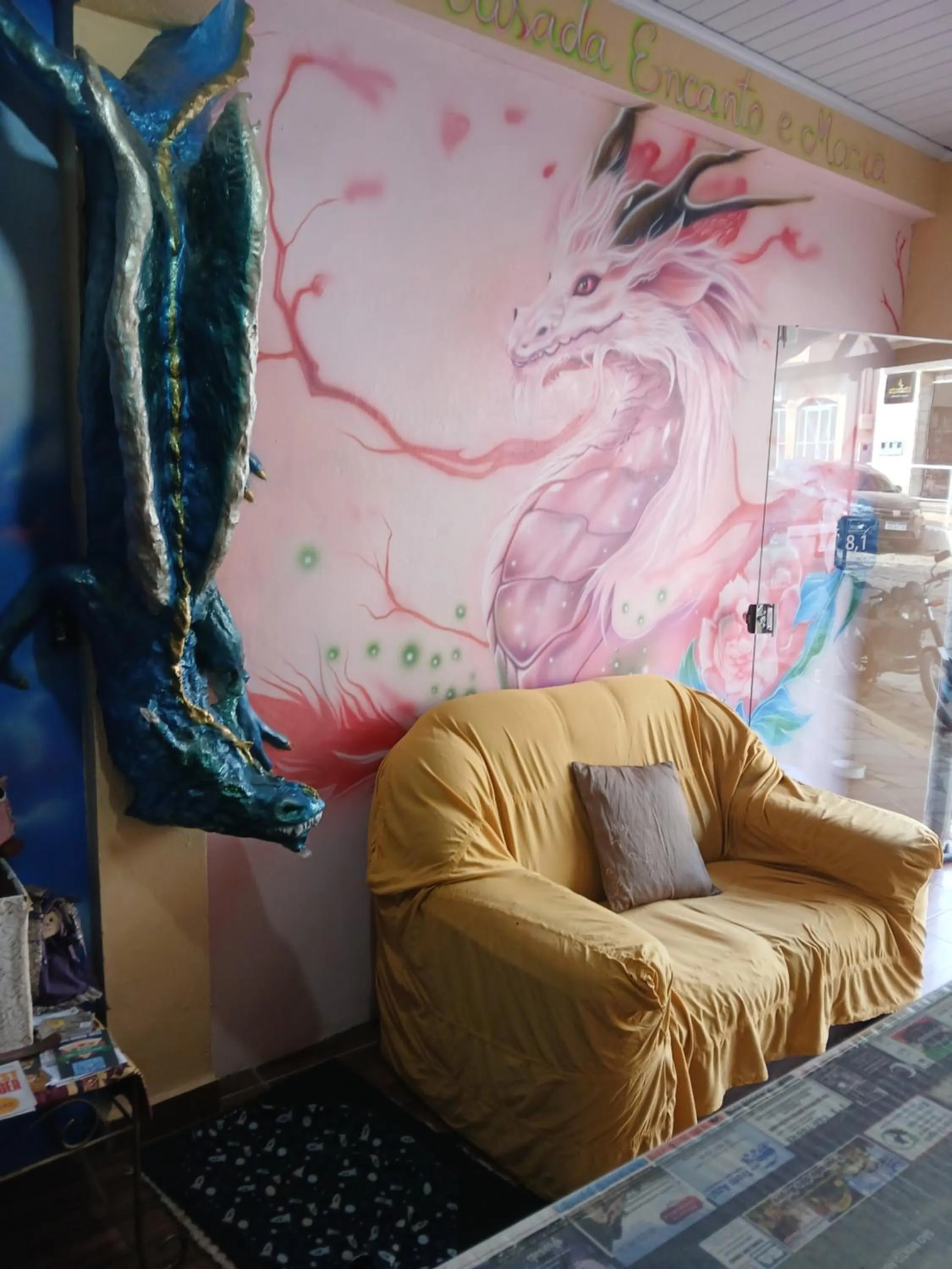 Living room, Bed in Pousada Encanto e Magia