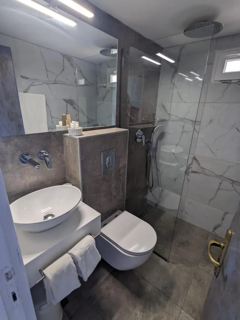 Shower in Pillbox Seafront Studios and Apartments