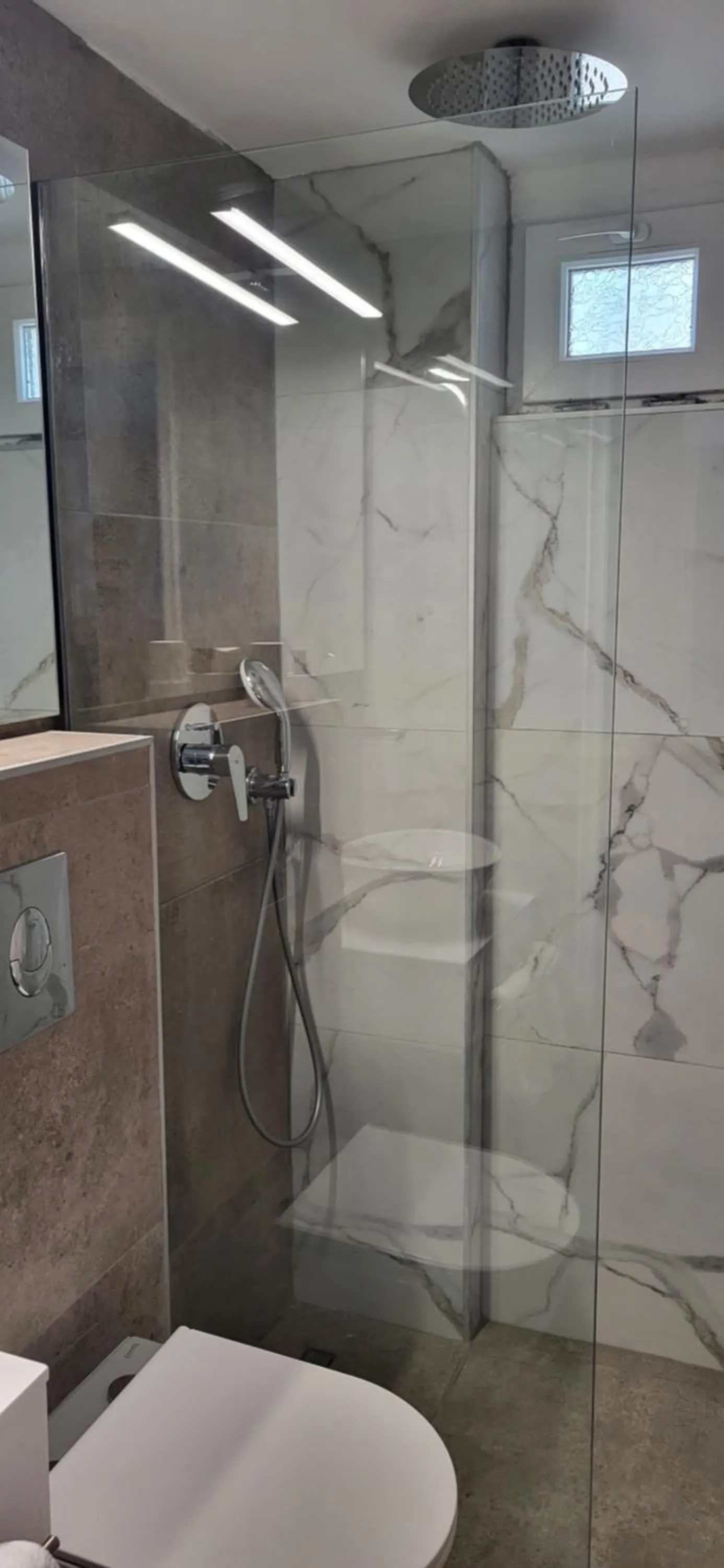 Shower in Pillbox Seafront Studios and Apartments