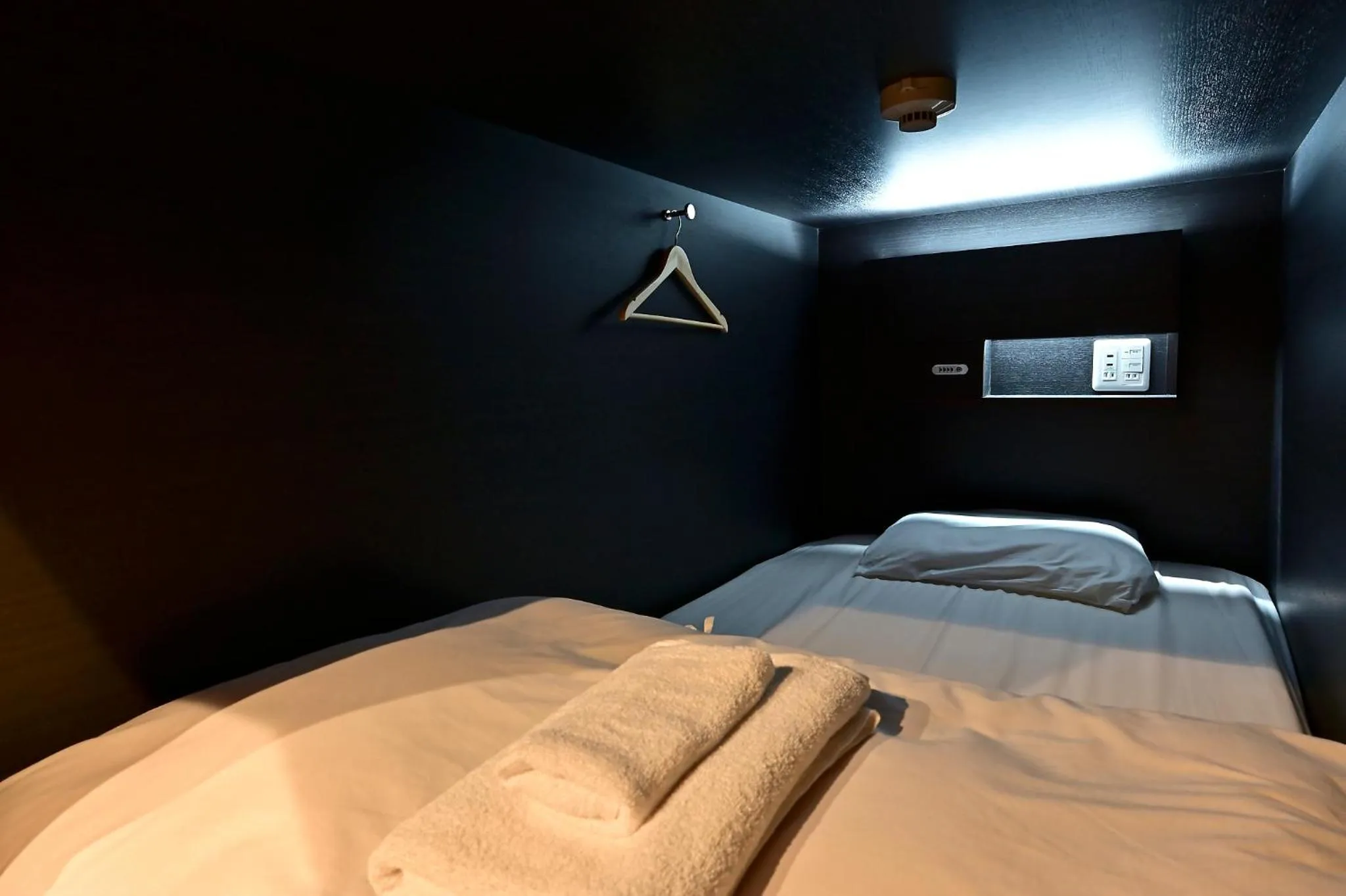 Bed in Hotel Tomariya Ueno