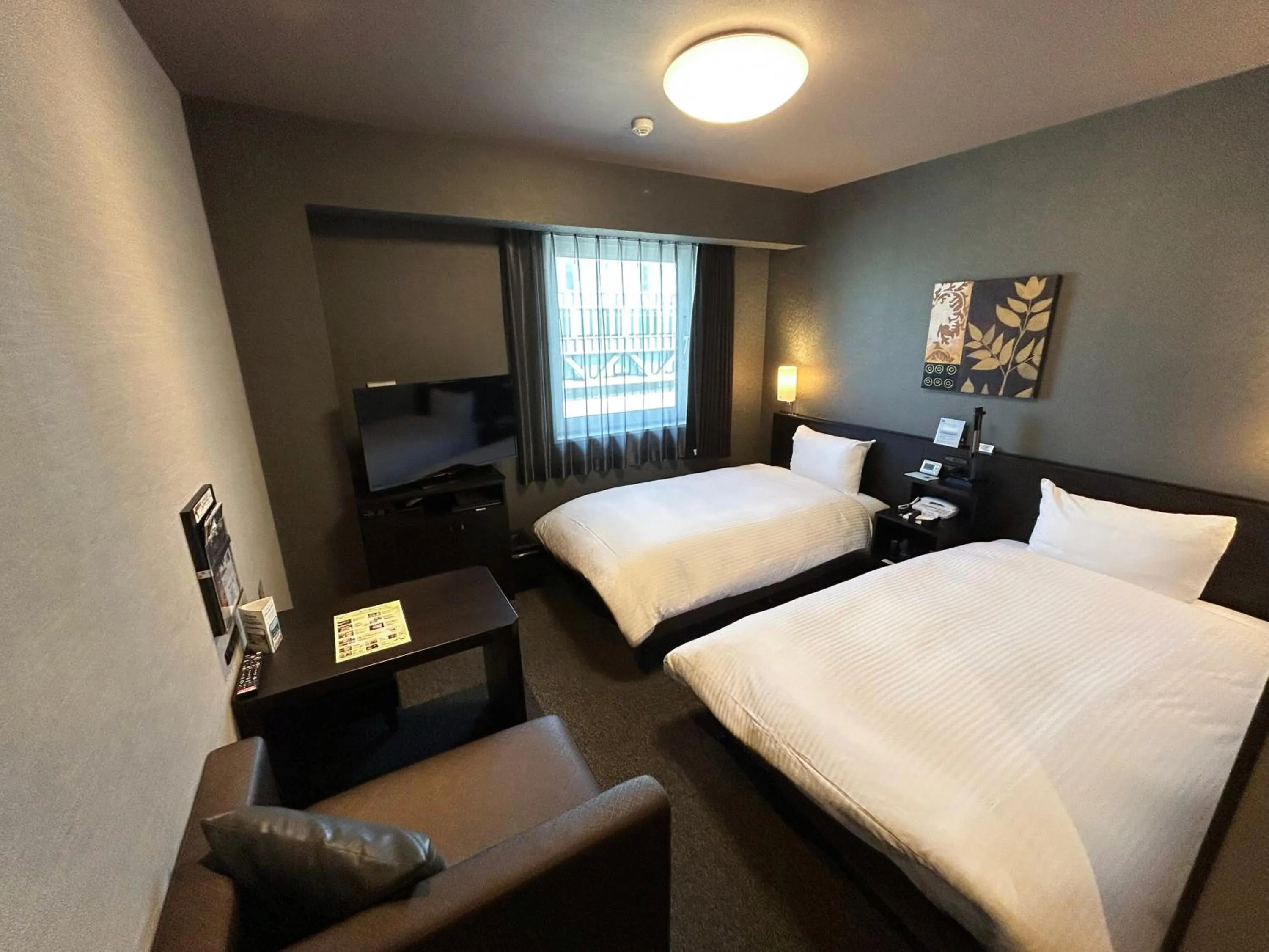 Photo of the whole room, Bed in Hotel Route-Inn Katori Sawara Ekimae