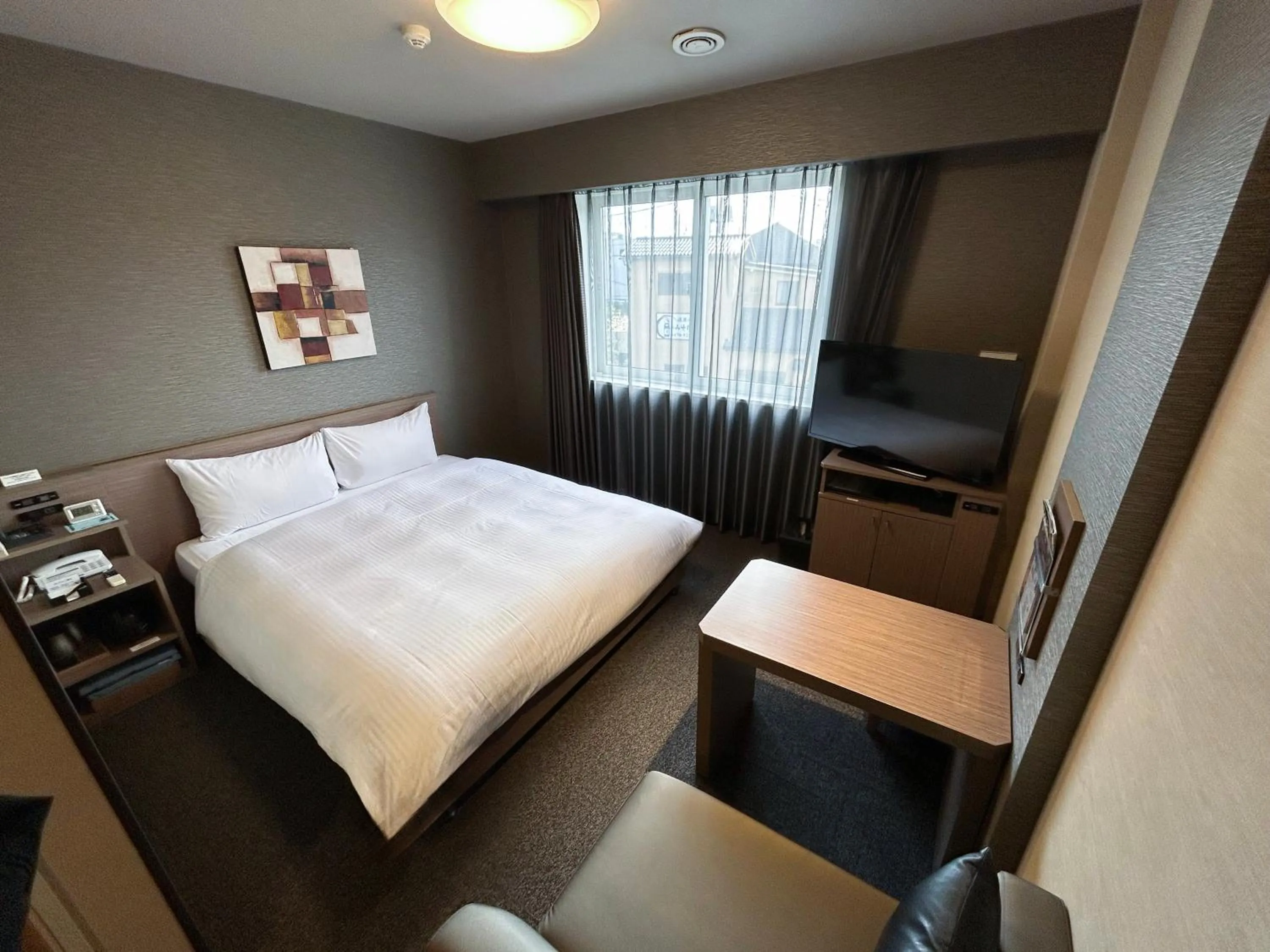 Photo of the whole room, Bed in Hotel Route-Inn Katori Sawara Ekimae