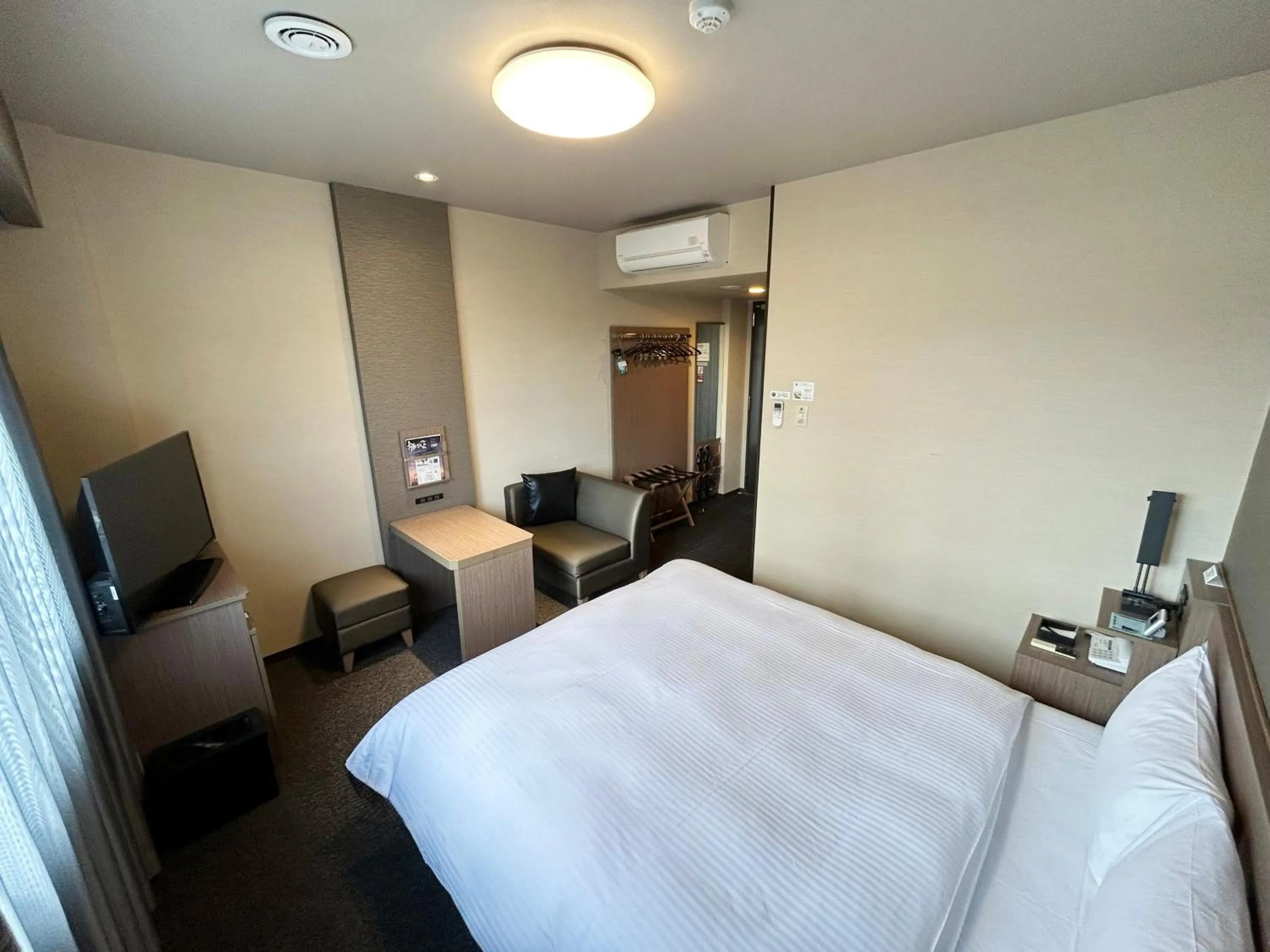 Photo of the whole room, Bed in Hotel Route-Inn Katori Sawara Ekimae