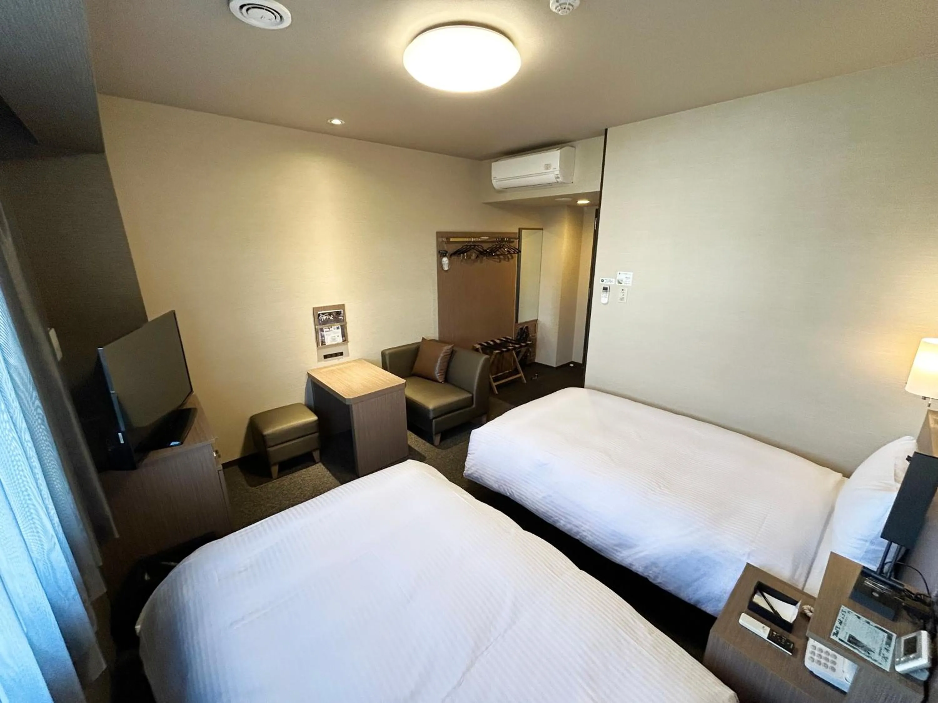 Photo of the whole room, Bed in Hotel Route-Inn Katori Sawara Ekimae