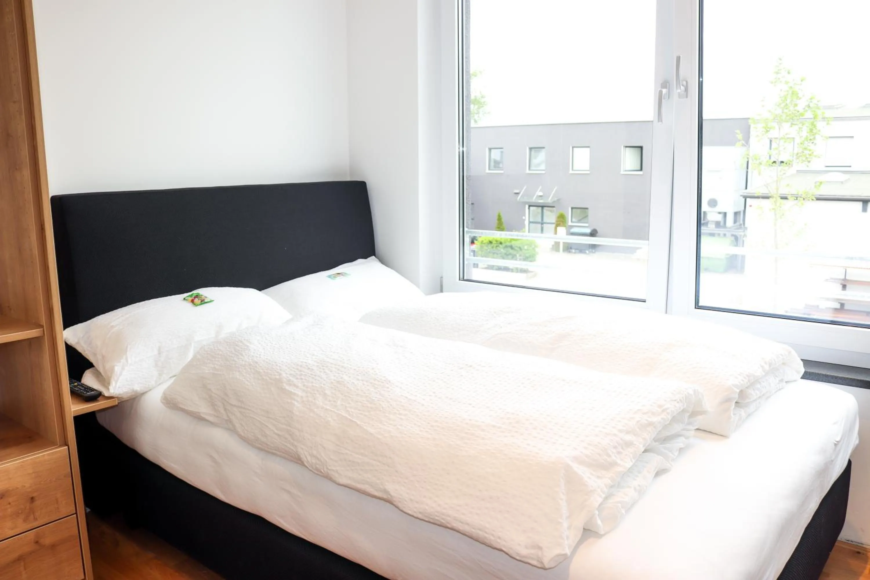 Bed in Das Fischer Boardinghouse BW