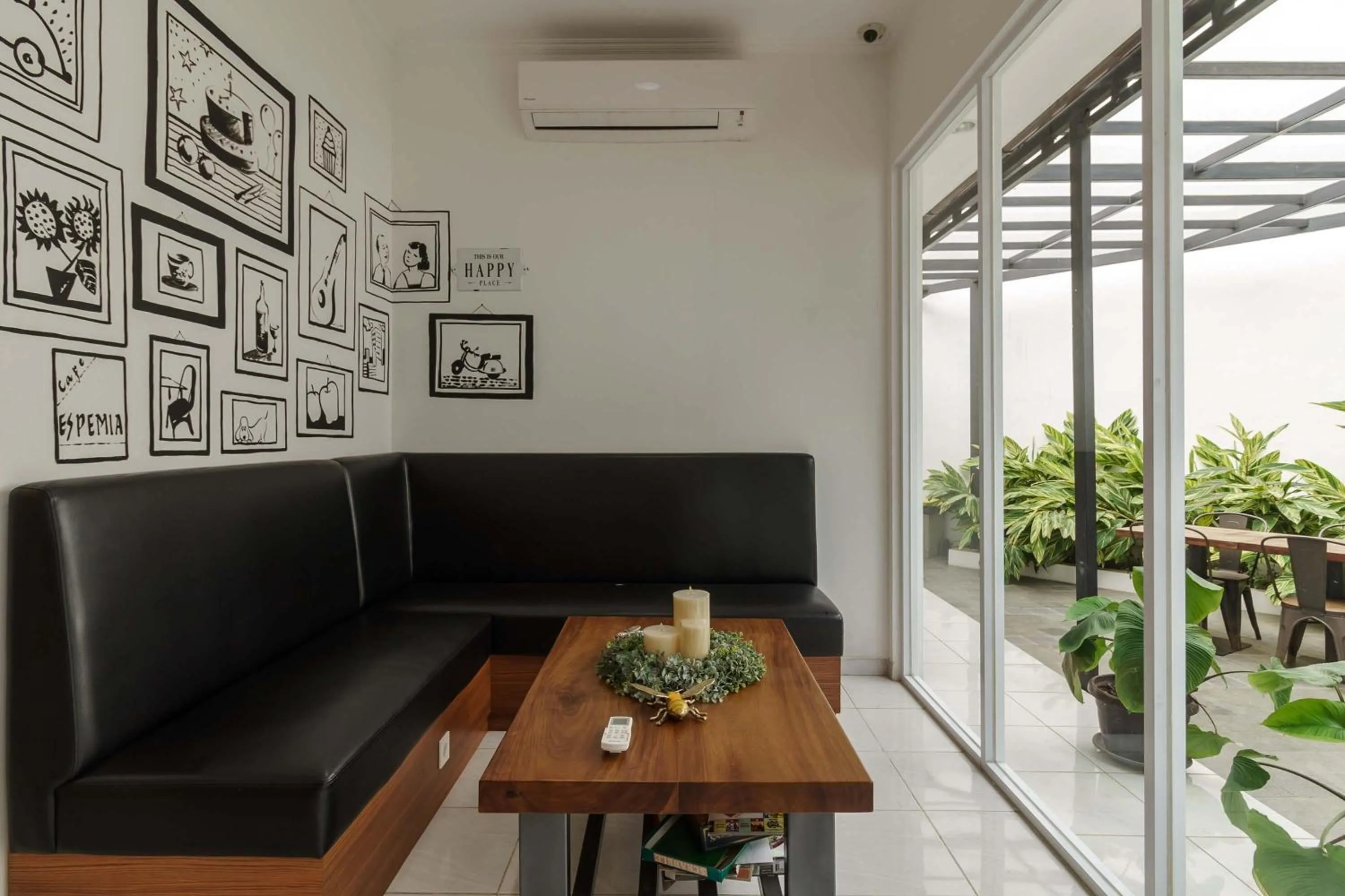 Seating area in RedDoorz Plus near Exit Toll Puncak 2