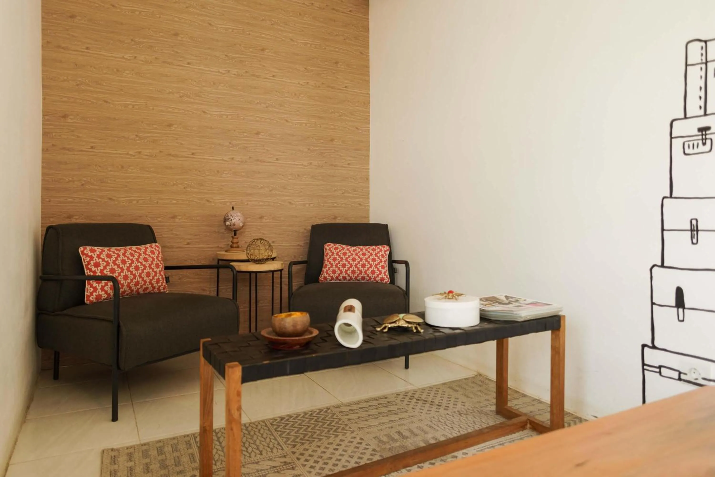 Seating area in RedDoorz Plus near Exit Toll Puncak 2