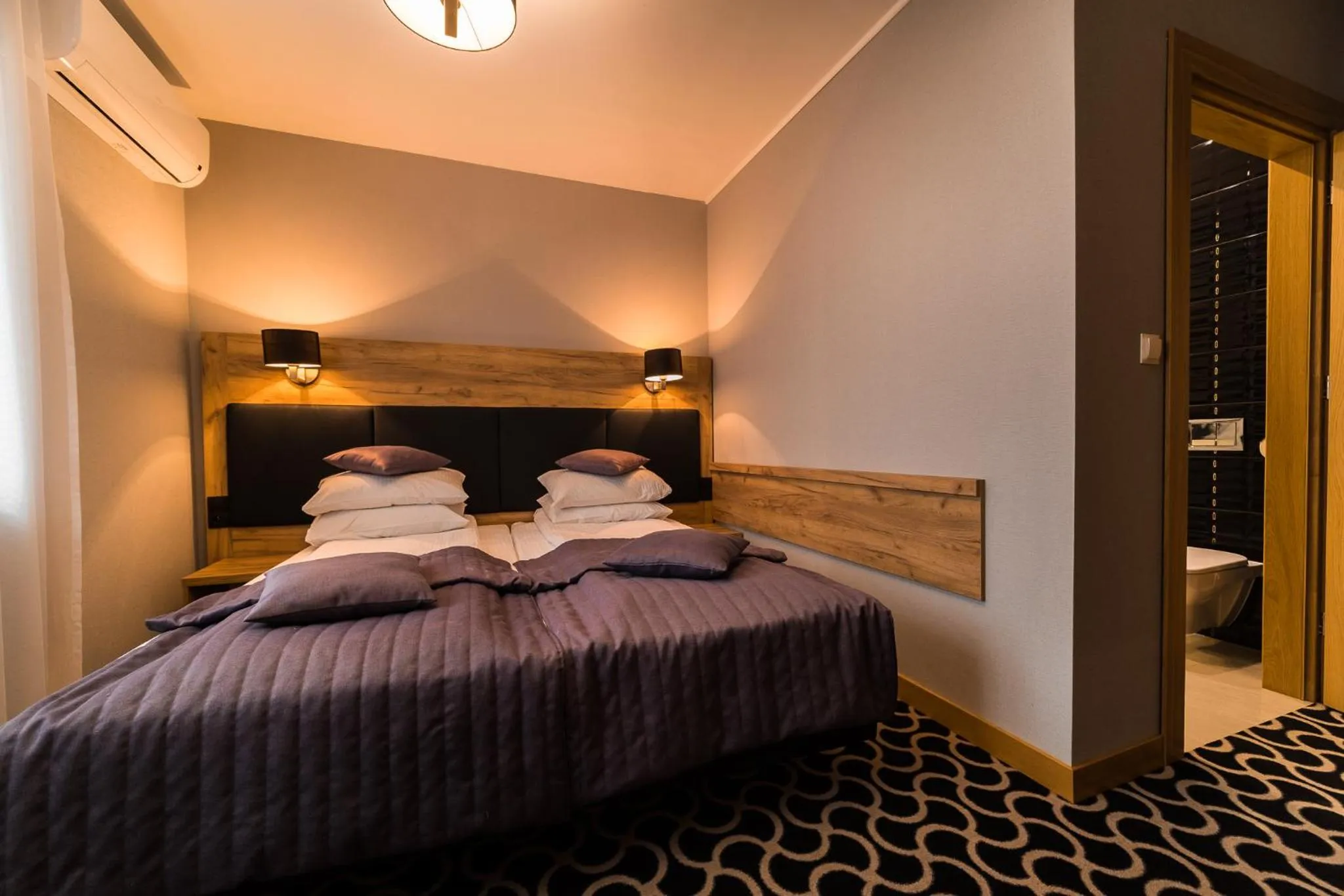 Bed in Hotel Coloseum