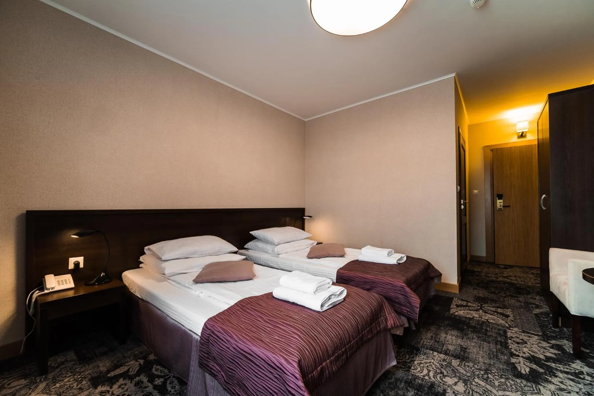 Bed in Hotel Coloseum