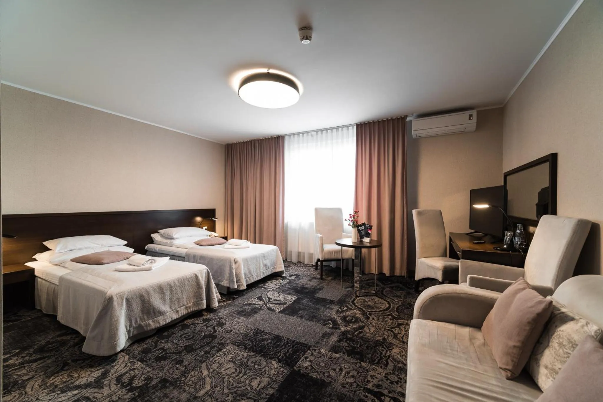 Bed in Hotel Coloseum