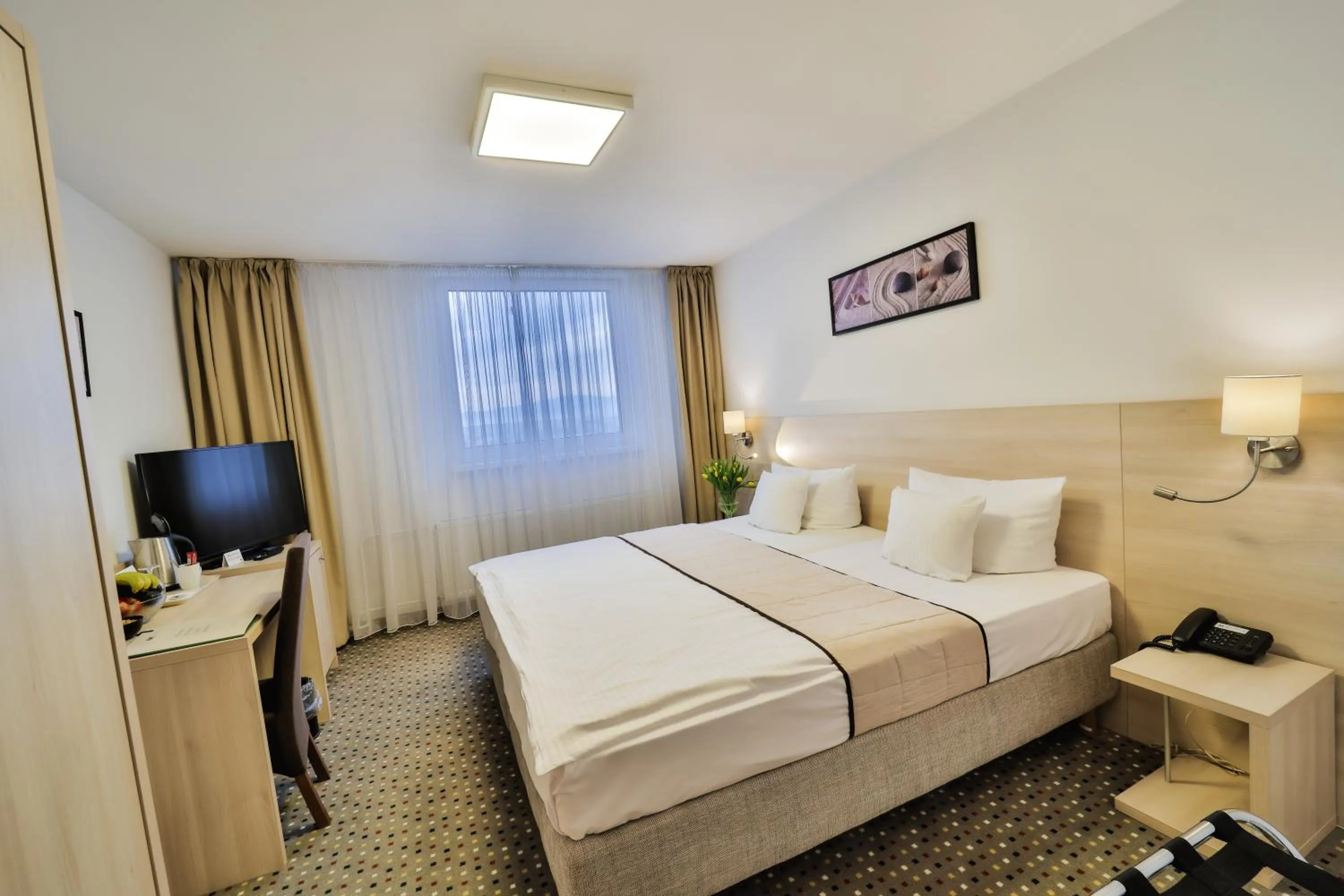 Bed in Hotel Metropol WELLNESS & CONGRESS HOTEL