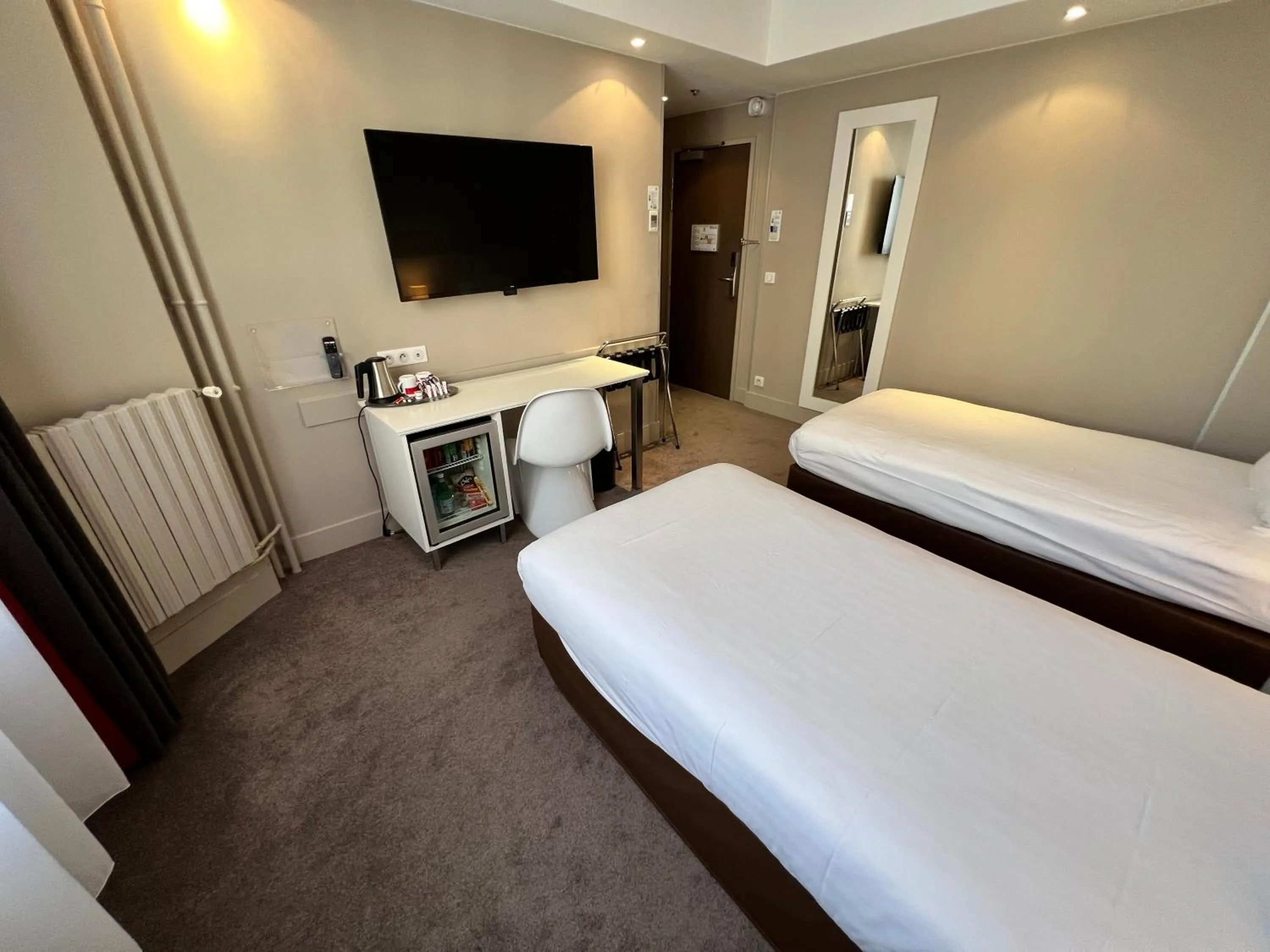 Bed in Holiday Inn Paris-Auteuil by IHG
