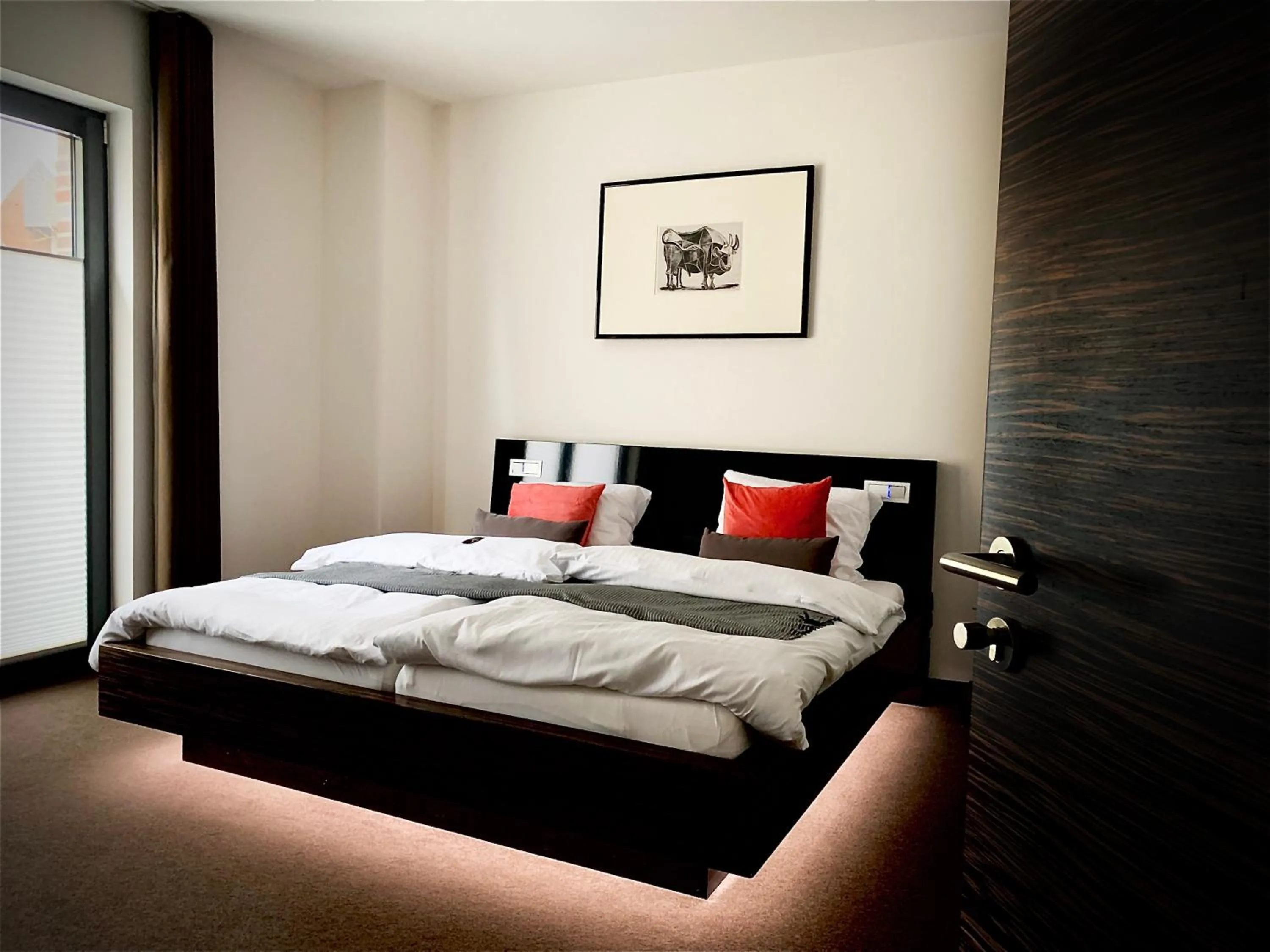 Bed in Hotel im Wigbold