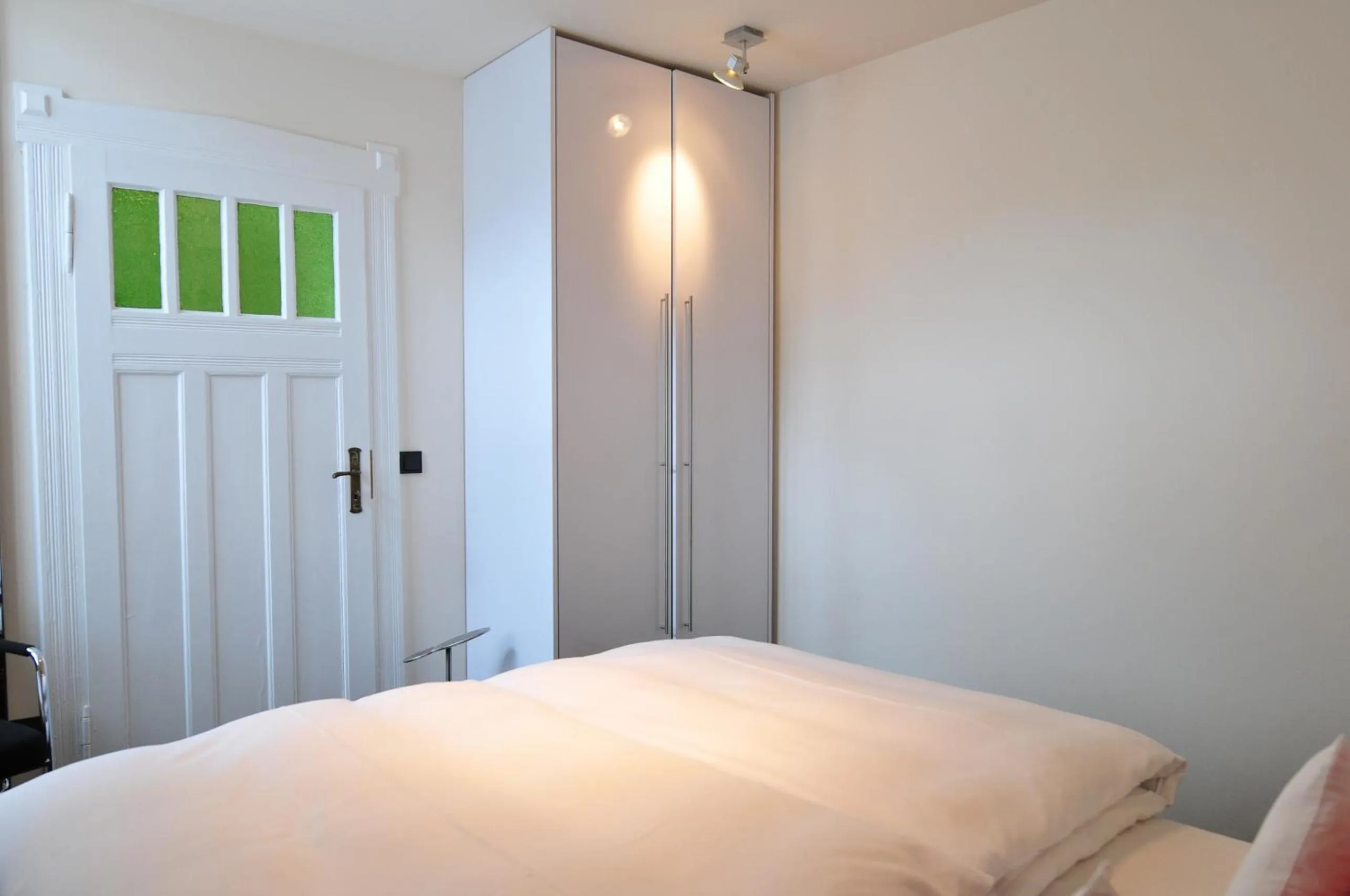 Bed in Hotel im Wigbold