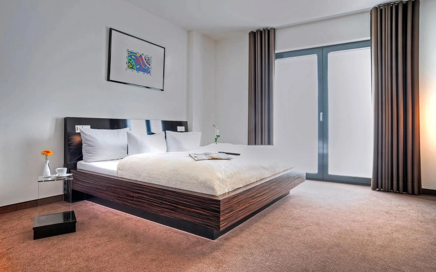 Bed in Hotel im Wigbold