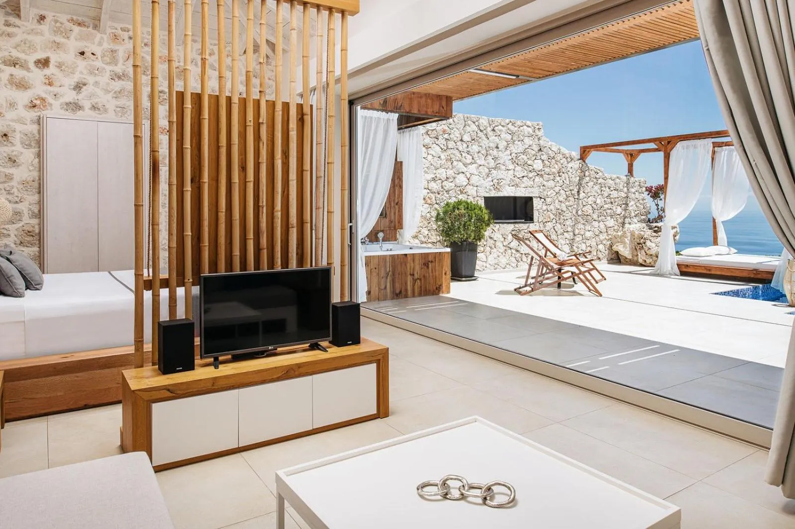 Seating area, Bed in Emerald Villas & Suites - The Finest Hotels Of The World