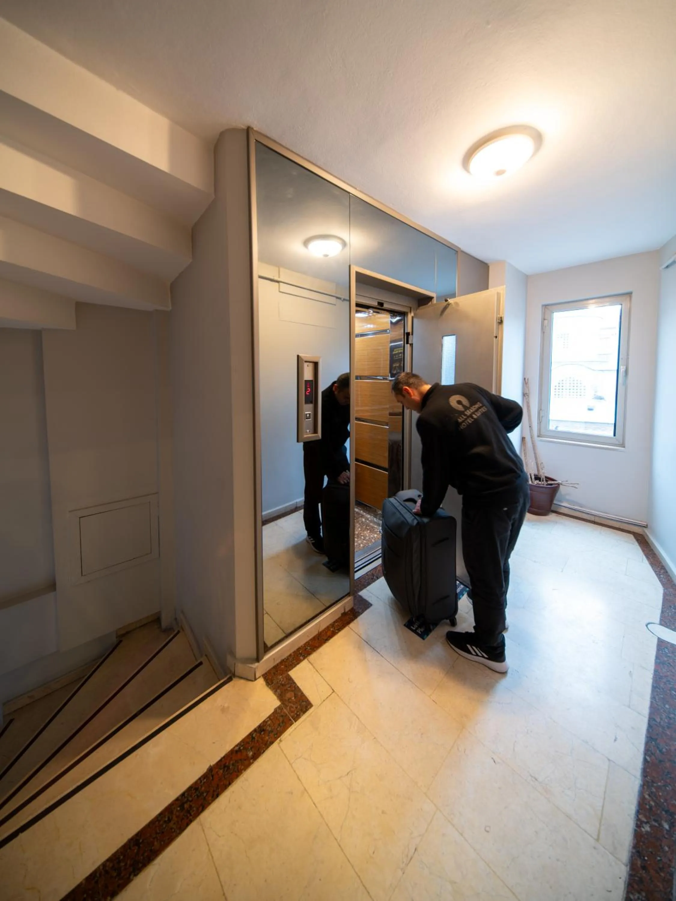 Staff in All Seasons Suites