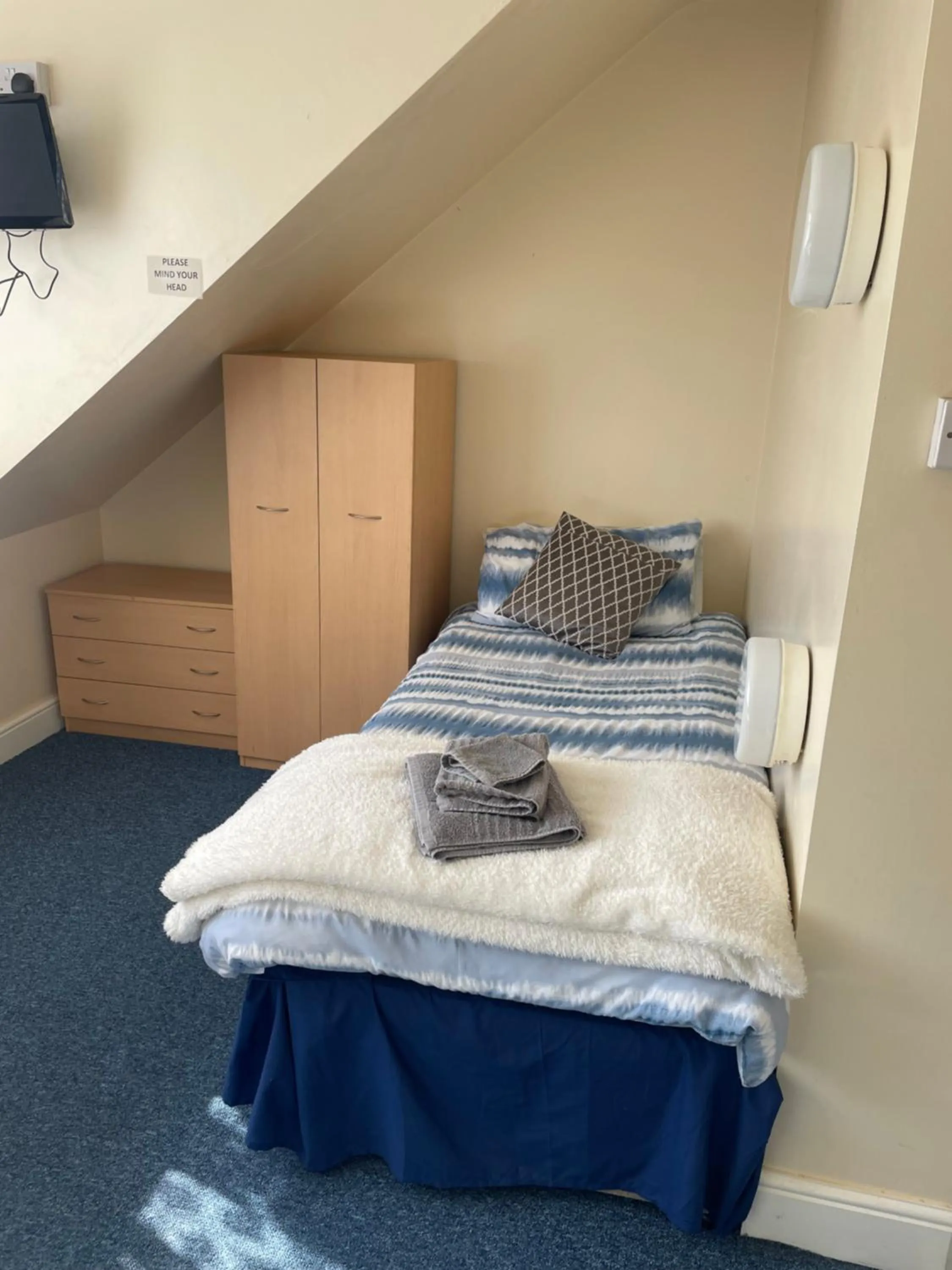 Bed in Ivydene Guest House