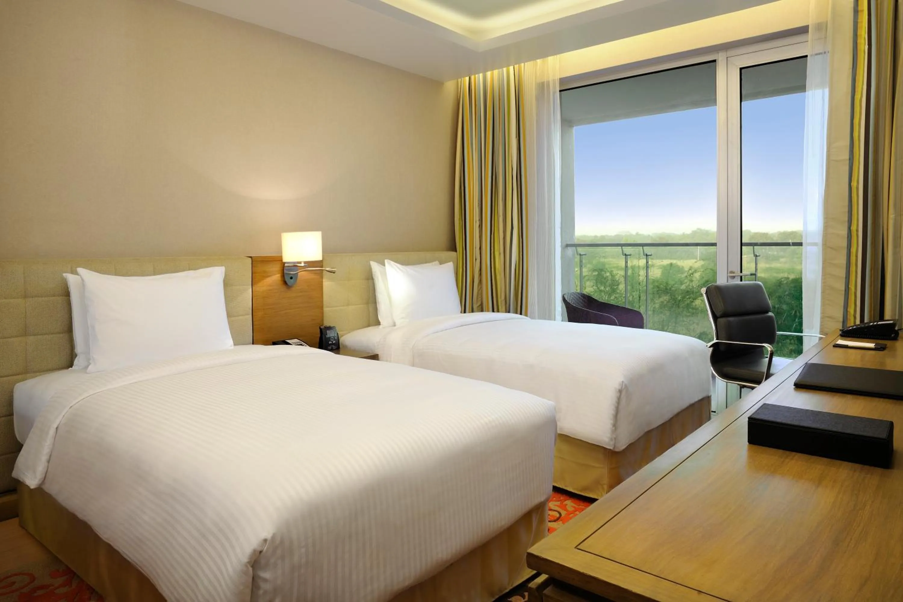 Balcony/Terrace, Bed in DoubleTree Suites by Hilton Bengaluru Outer Ring Road