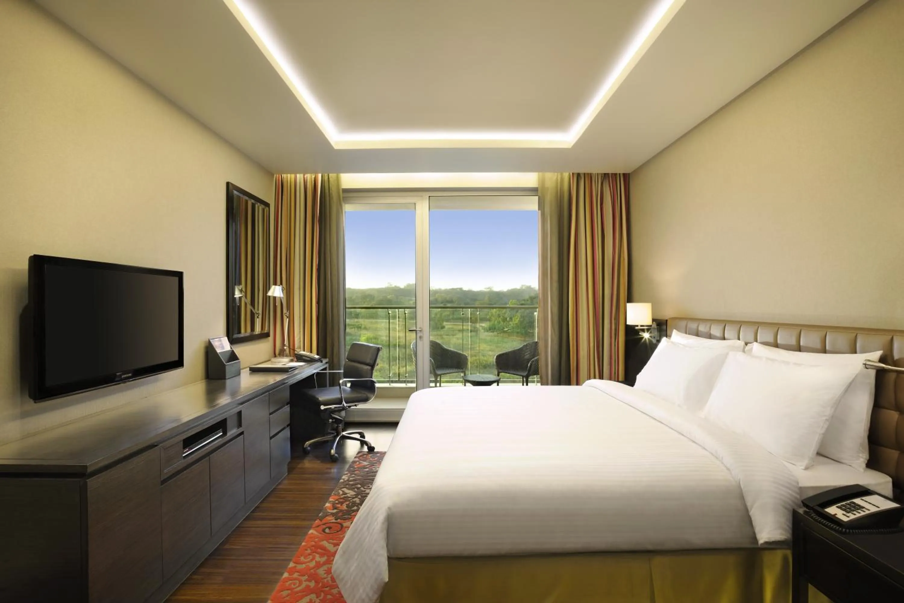 View (from property/room), Bed in DoubleTree Suites by Hilton Bengaluru Outer Ring Road