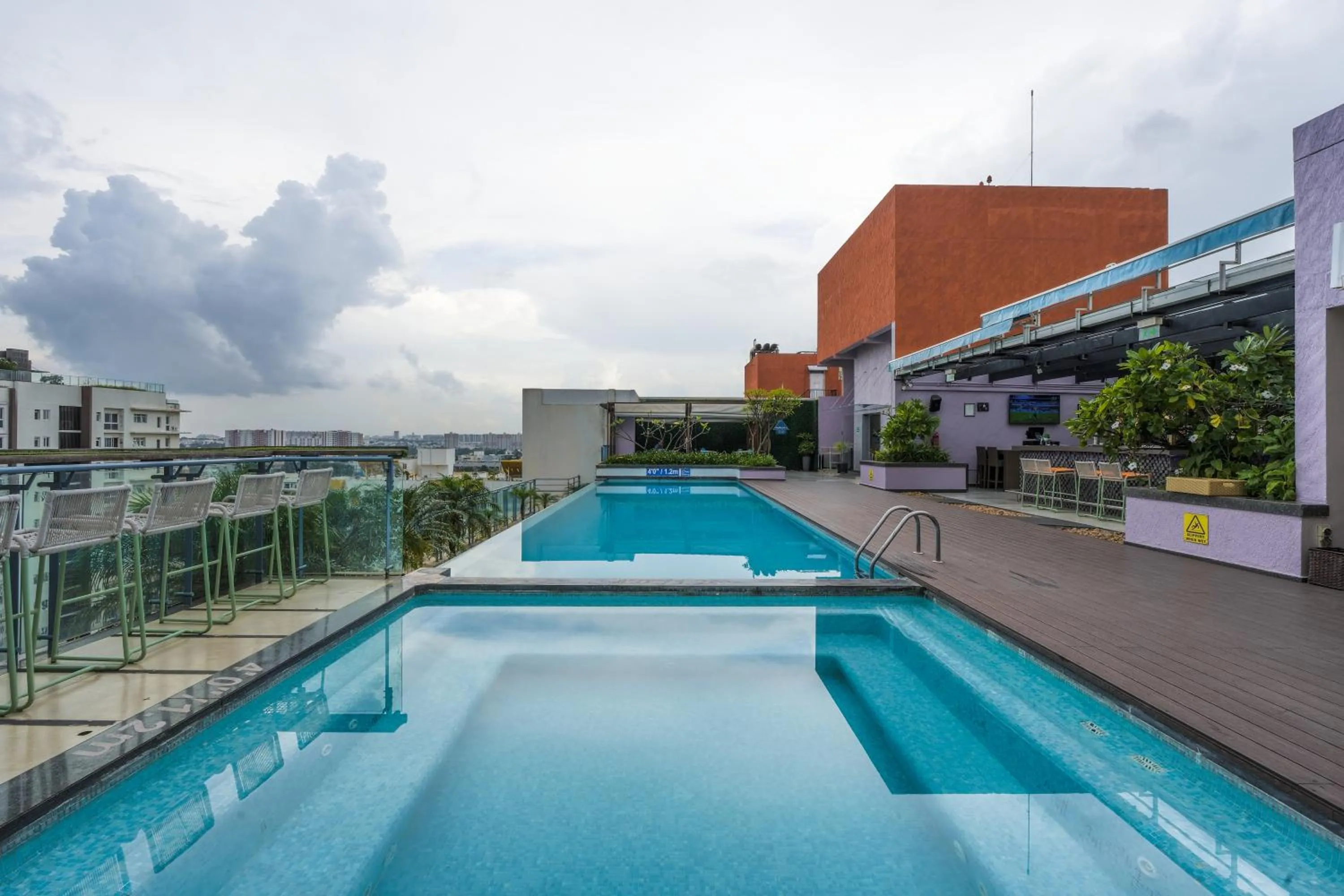 Swimming pool in DoubleTree Suites by Hilton Bengaluru Outer Ring Road