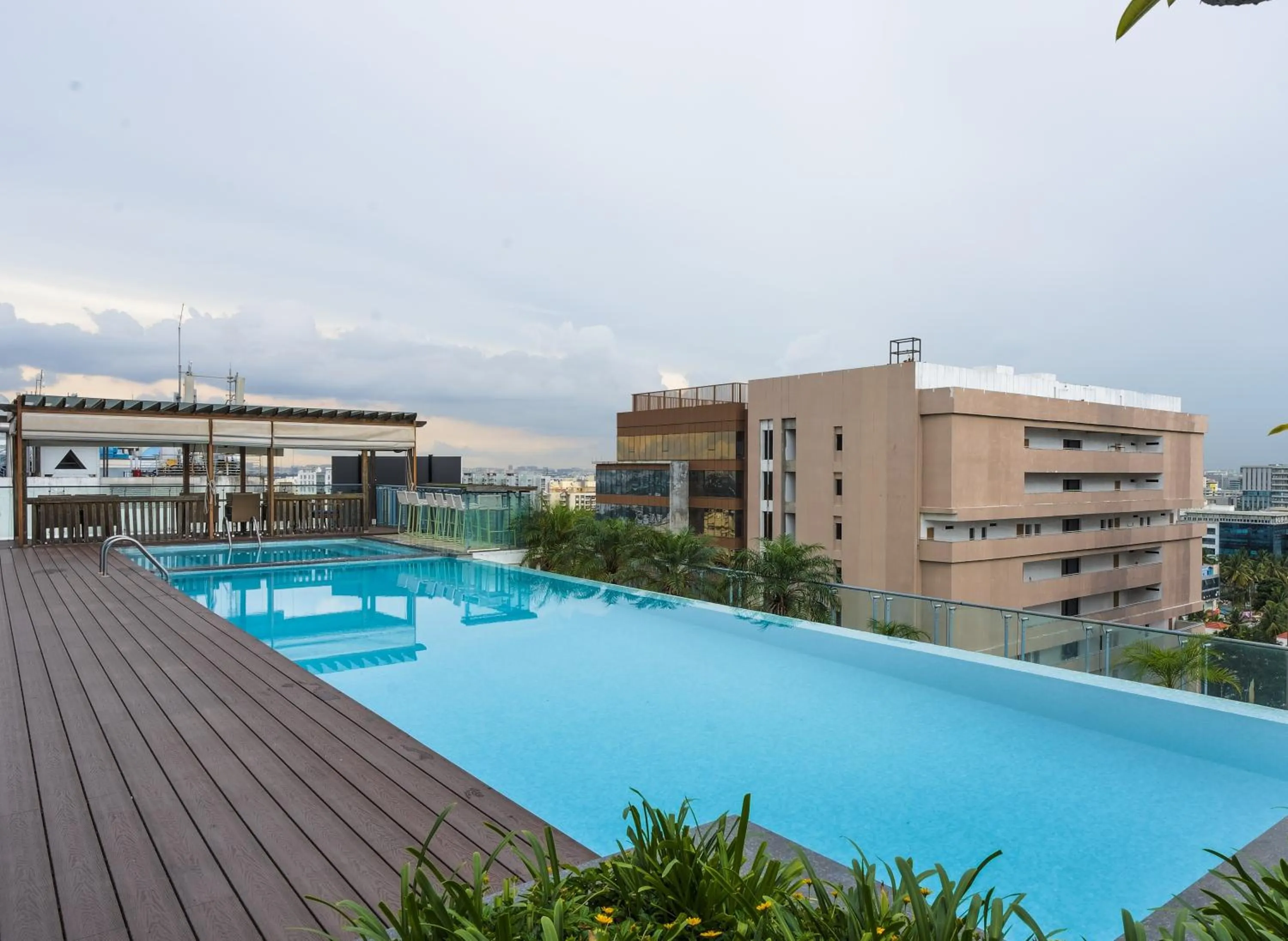 Swimming pool in DoubleTree Suites by Hilton Bengaluru Outer Ring Road