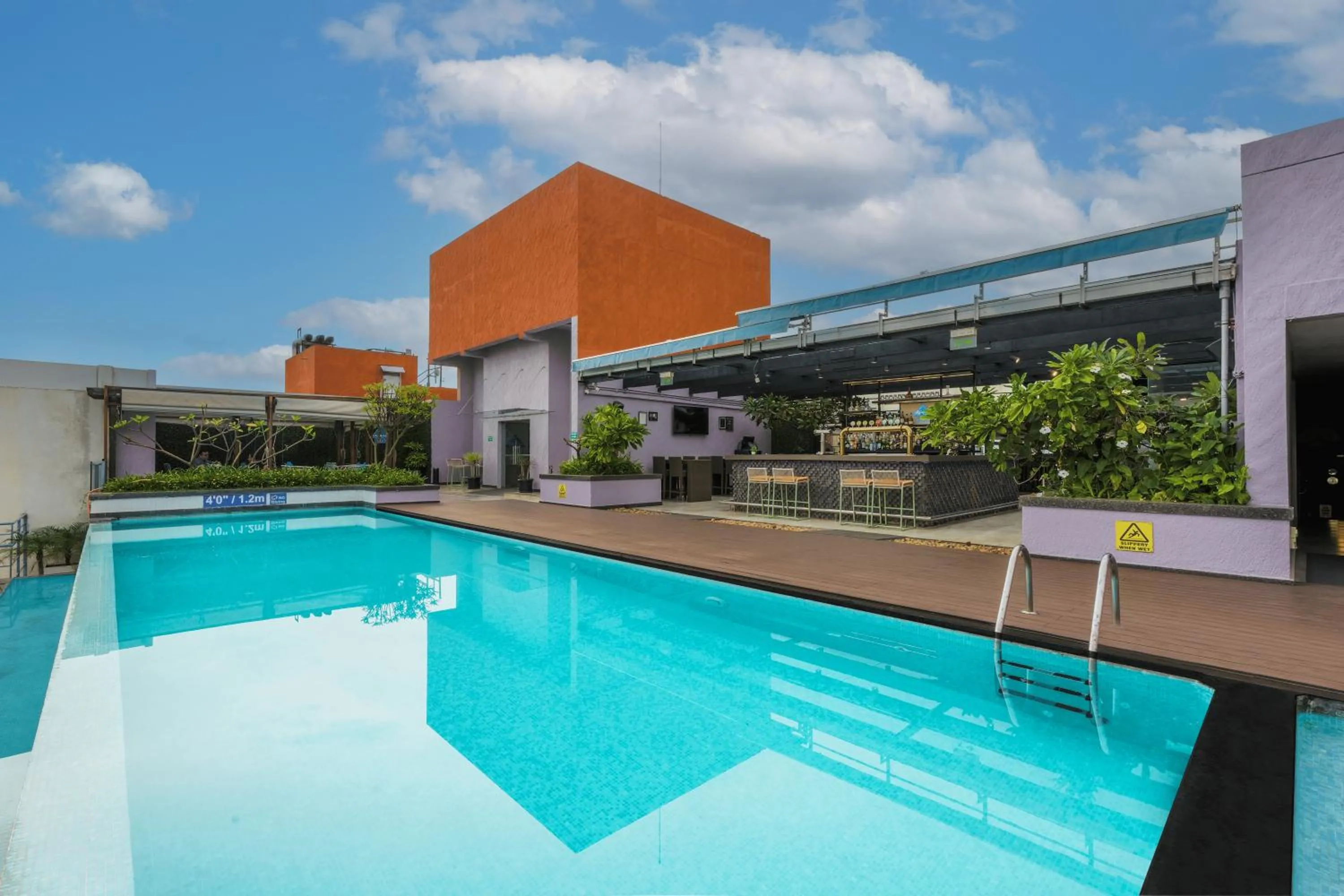 Swimming pool in DoubleTree Suites by Hilton Bengaluru Outer Ring Road