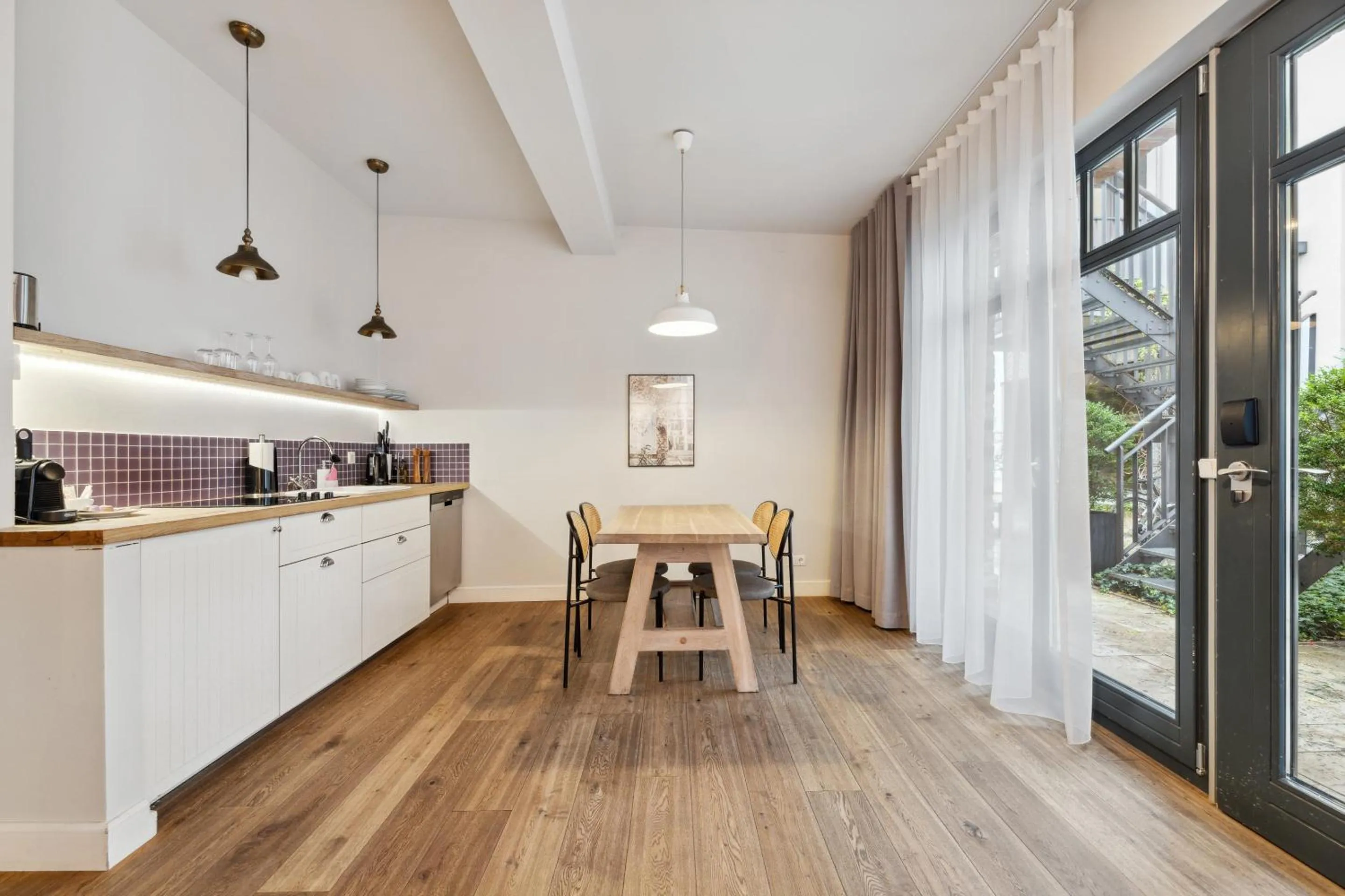 Kitchen or kitchenette in Limehome Berlin Prenzlauer Allee - Digital Access