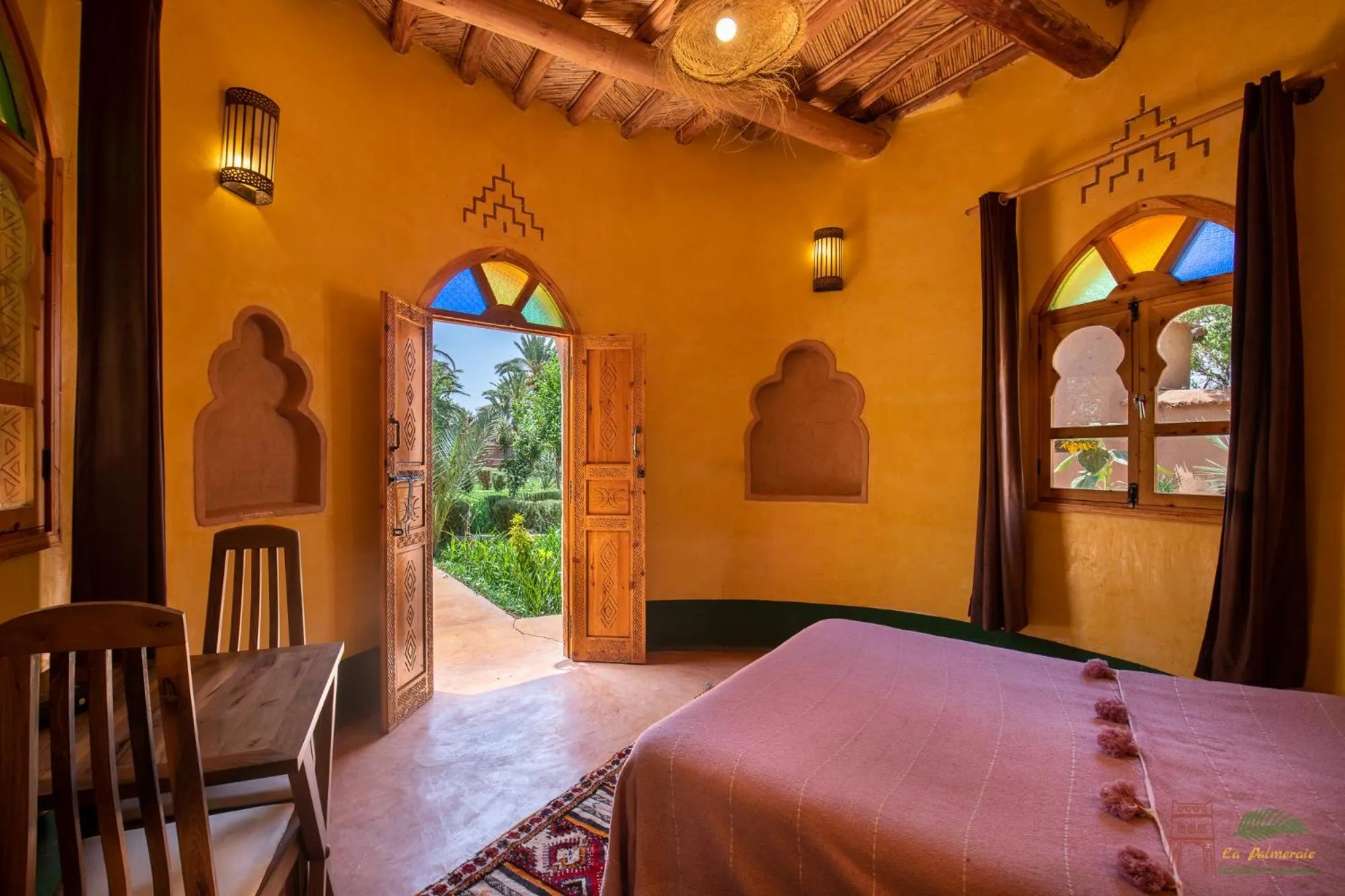 Photo of the whole room, Bed in Ecolodge La Palmeraie