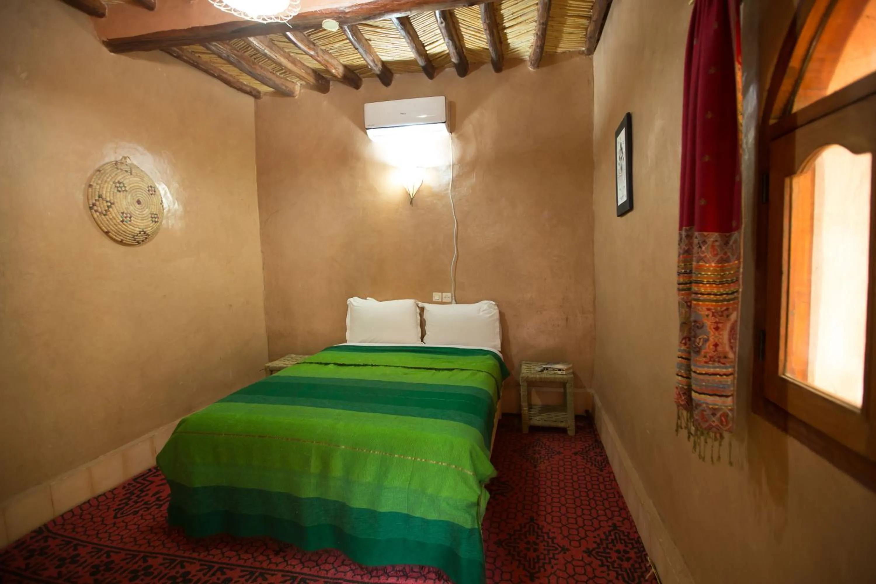 Bed in Ecolodge La Palmeraie