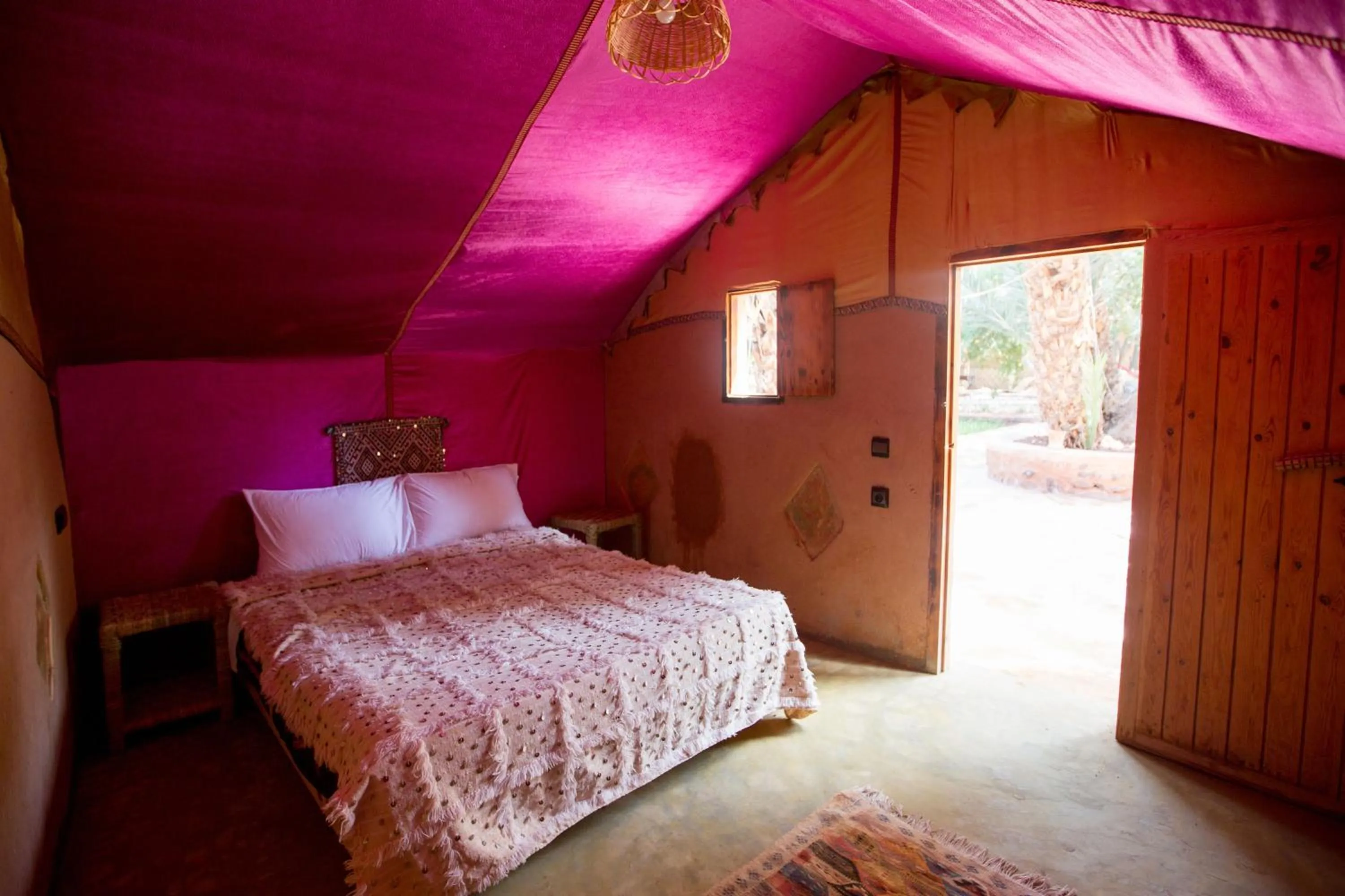 Bed in Ecolodge La Palmeraie