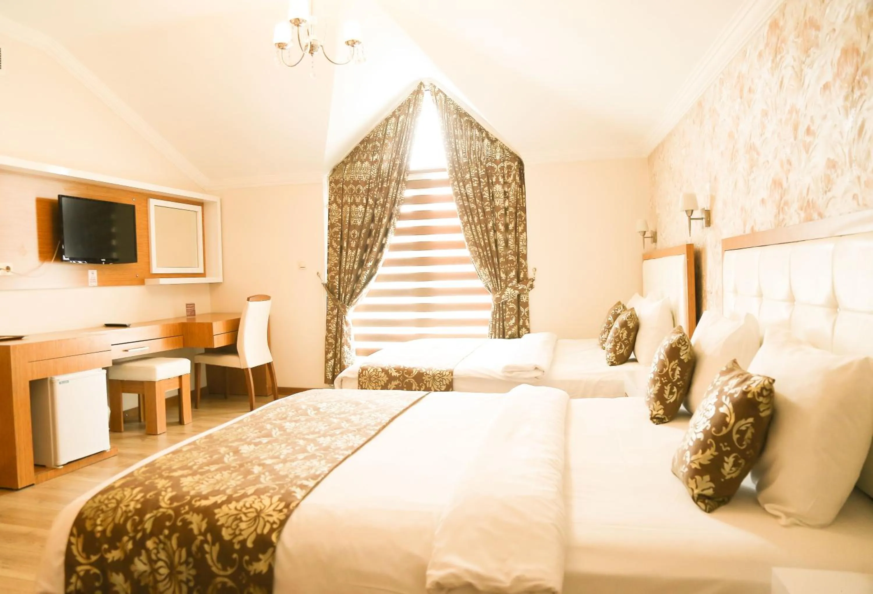 Bed in Cebeciler Hotel