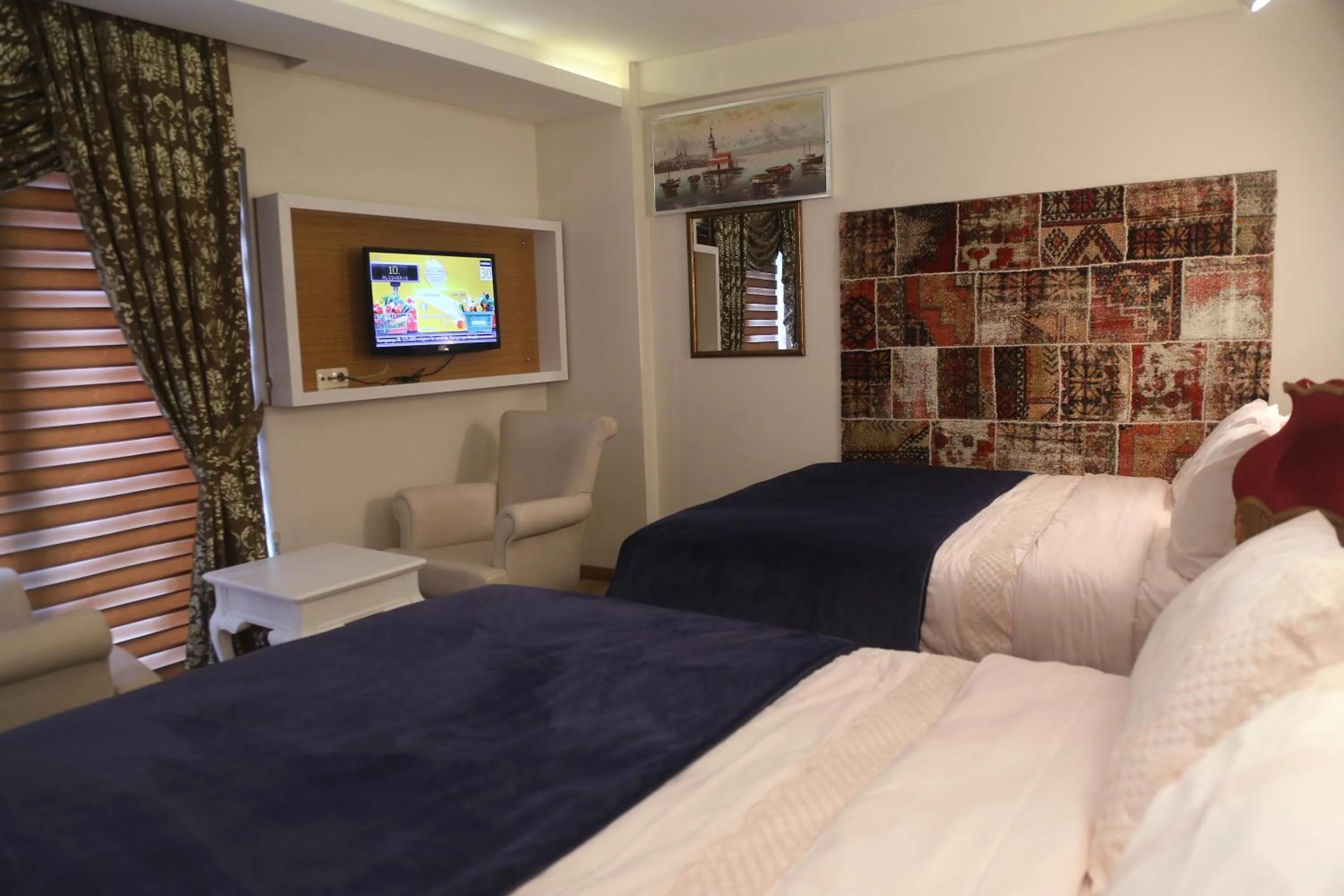 Communal lounge/ TV room, Bed in Cebeciler Hotel