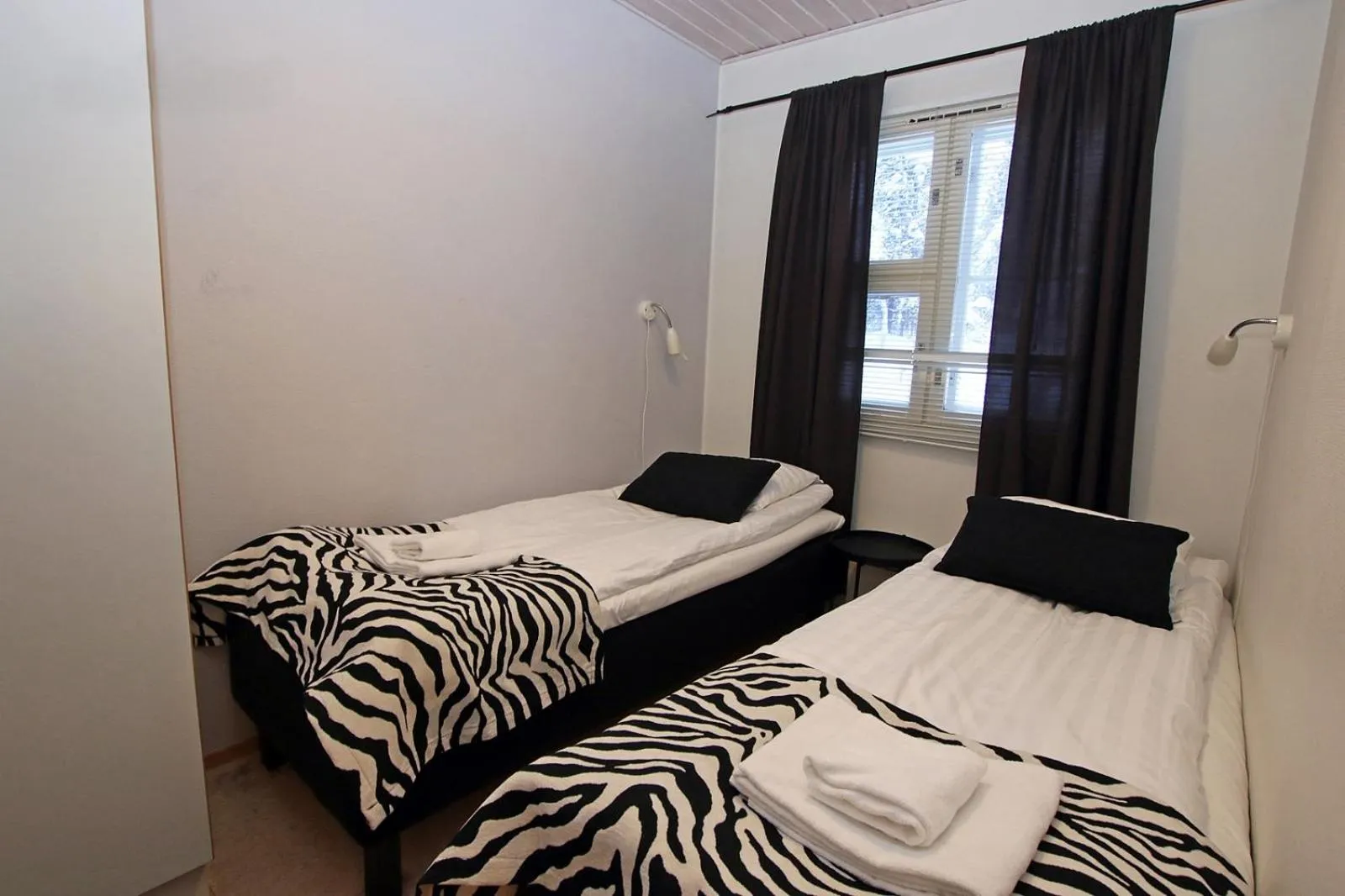 Bed in Kuukkeli Apartments Saarisatu ja Urupää