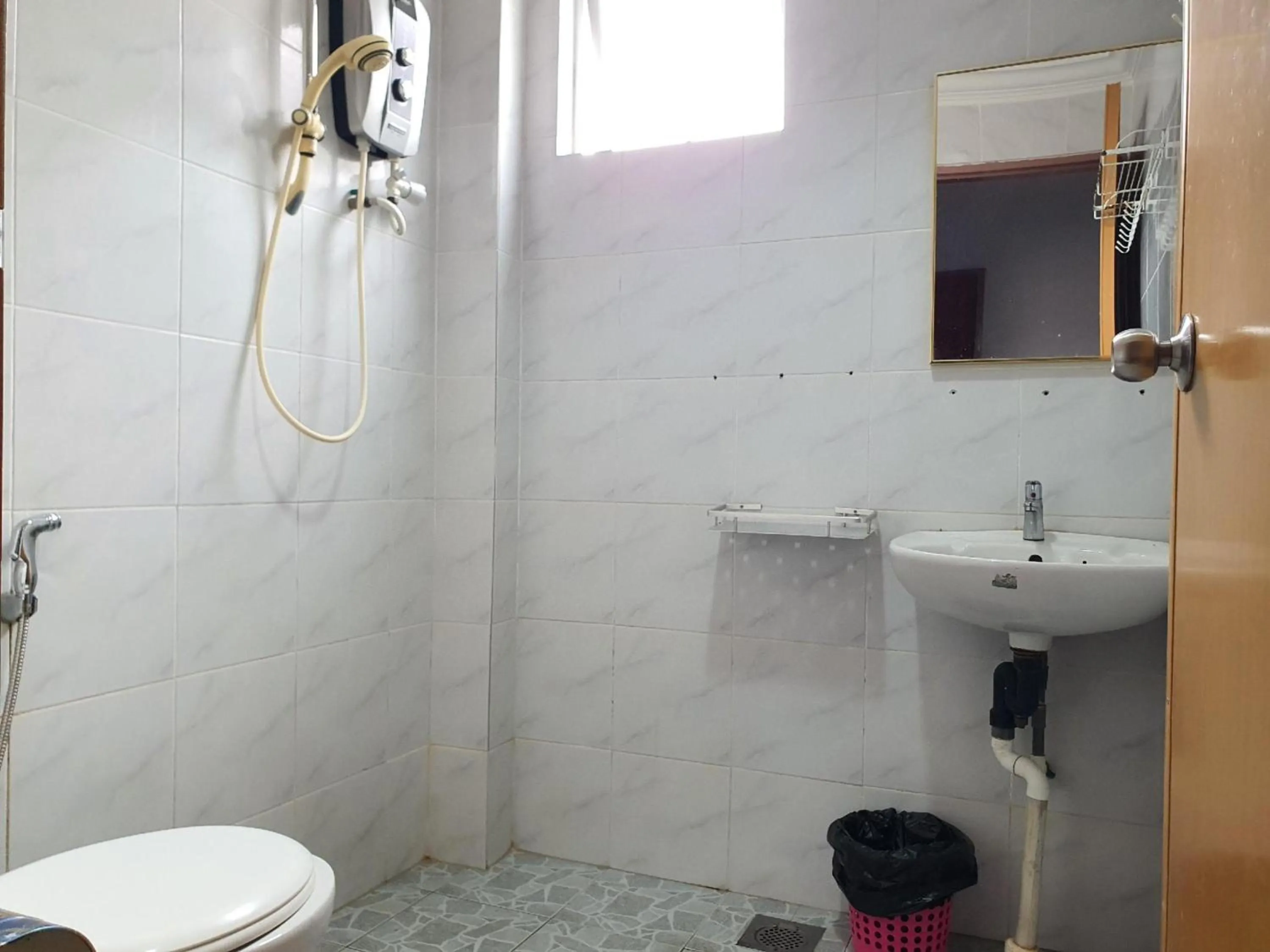 Bathroom in Hotel O Melody 88 Inn