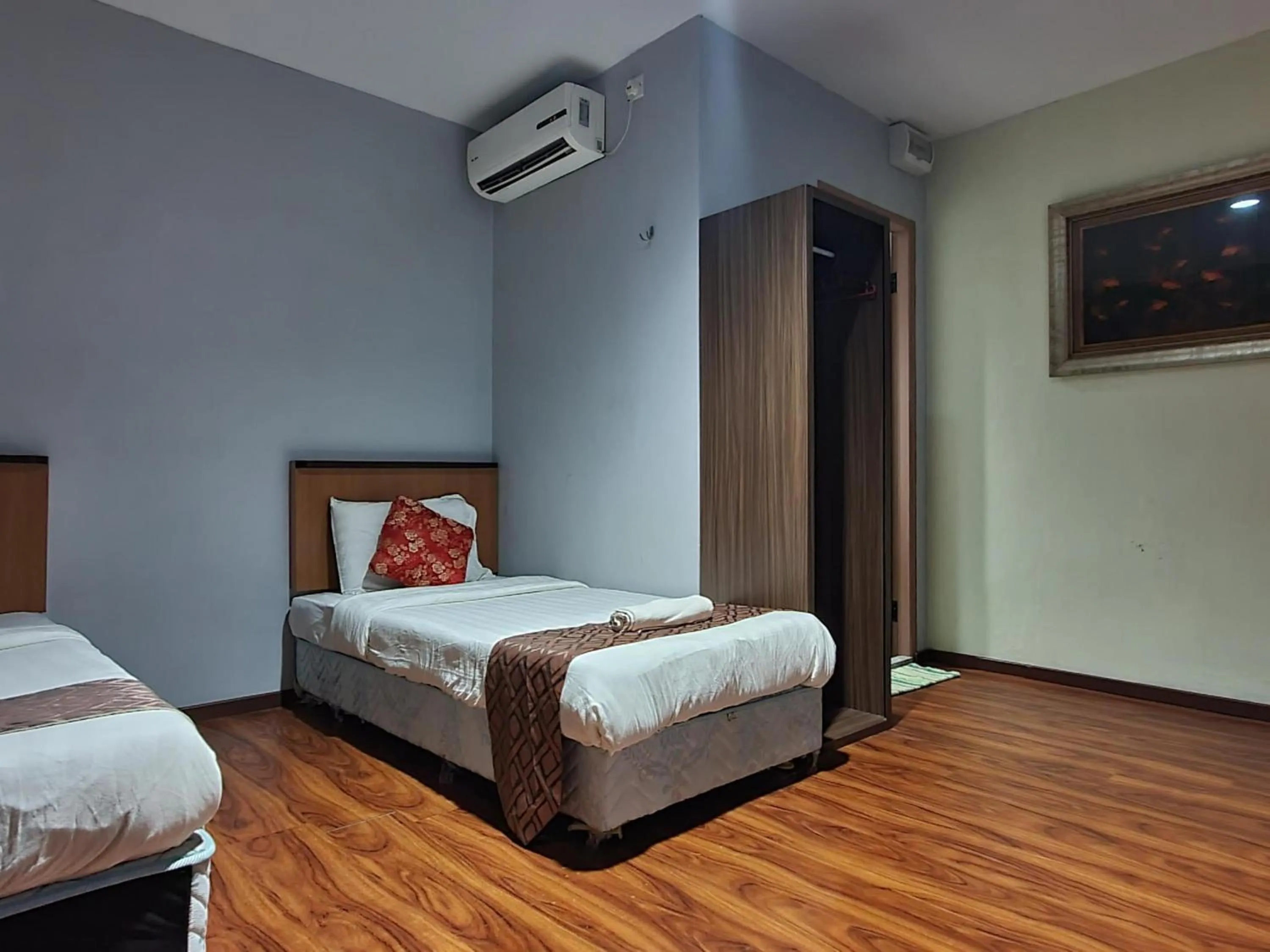 Photo of the whole room, Bed in Hotel O Melody 88 Inn