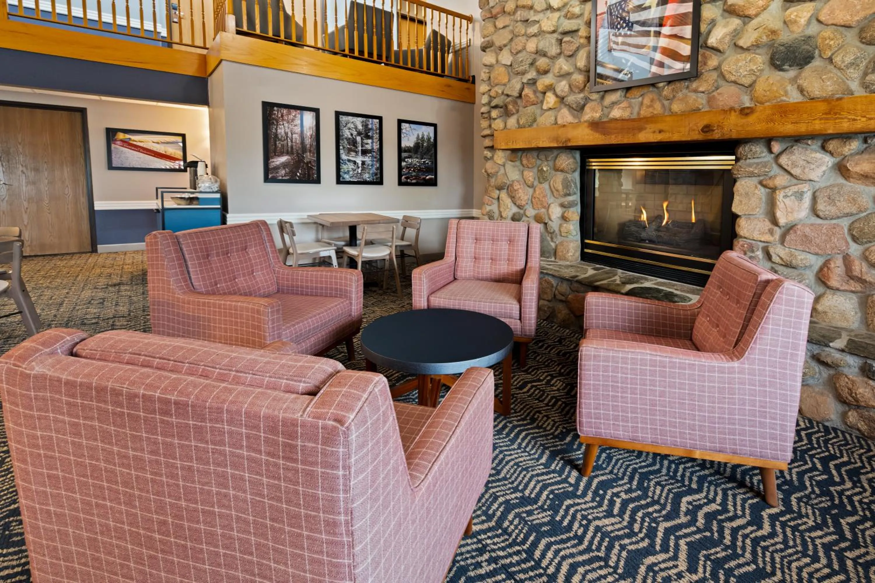 Seating area in AmericInn by Wyndham Bismarck