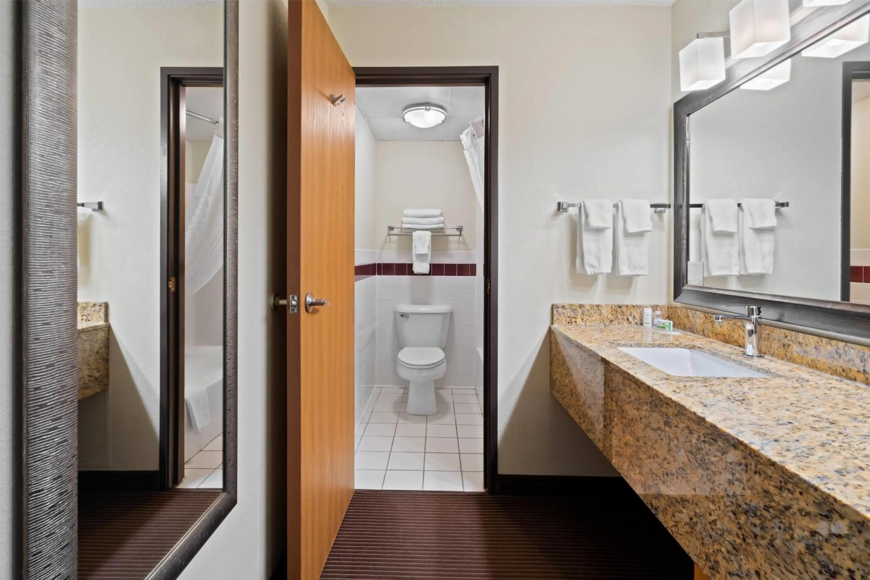 Bathroom in AmericInn by Wyndham Bismarck