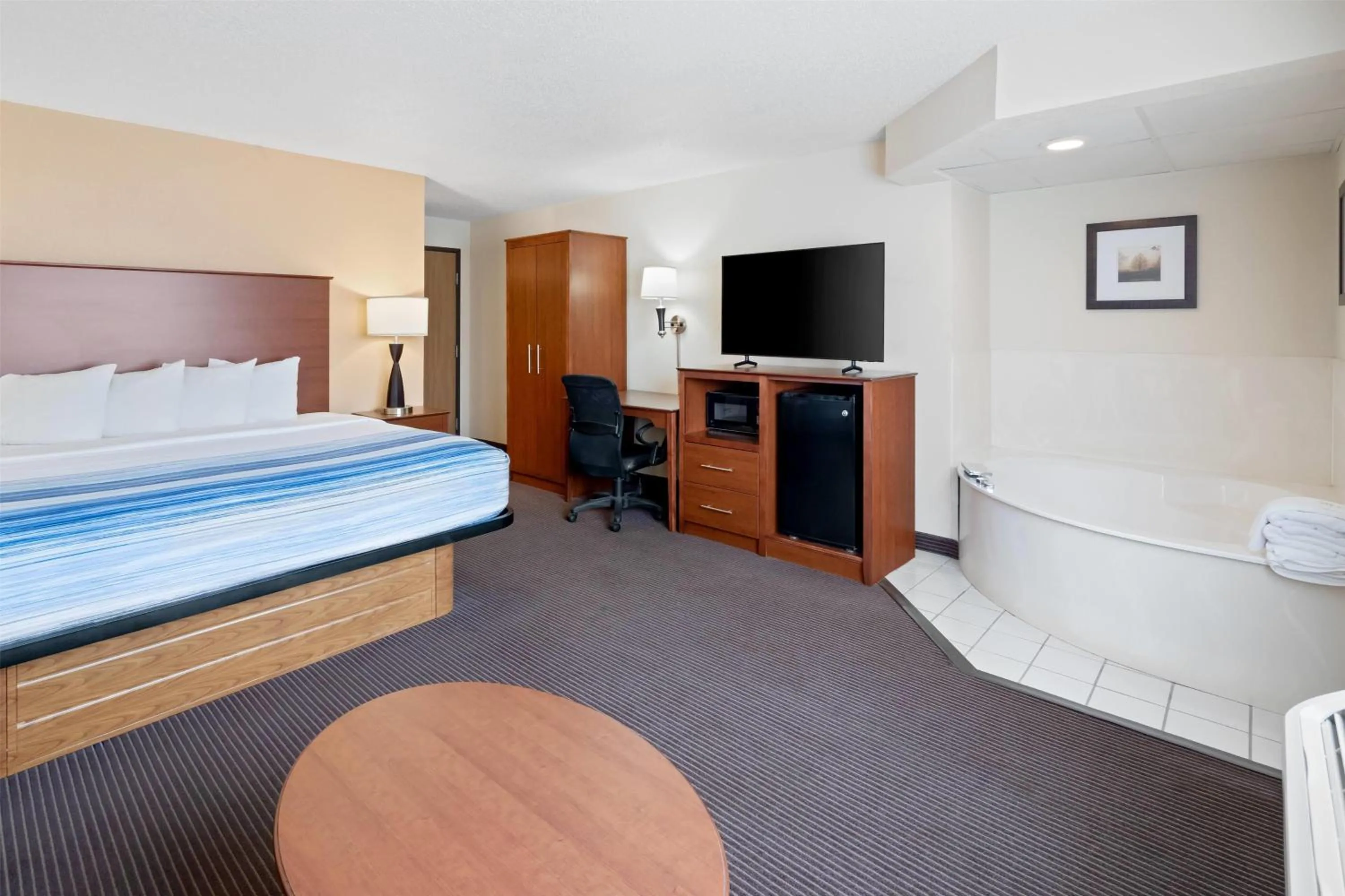 Photo of the whole room, Bed in AmericInn by Wyndham Bismarck