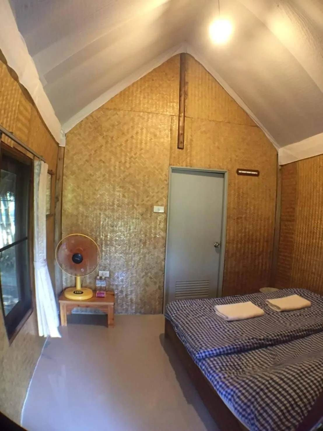 Bed in Baan Pai Riverside Resort