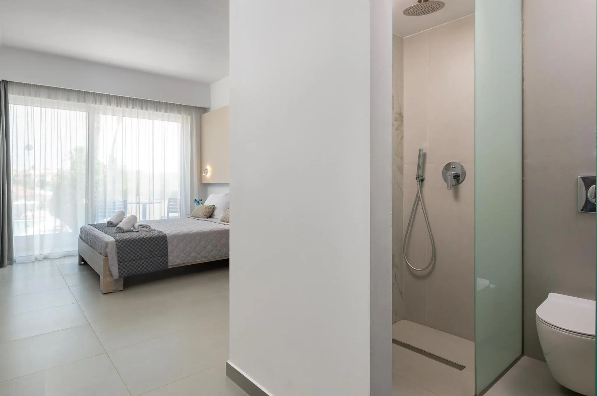 Bed in Olive Garden Hotel