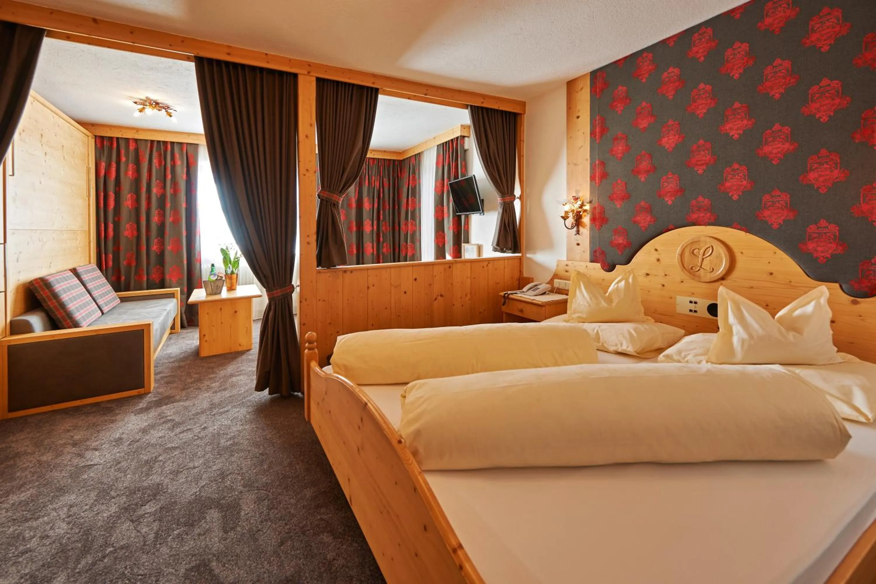 Bed in Alpenhotel Laurin