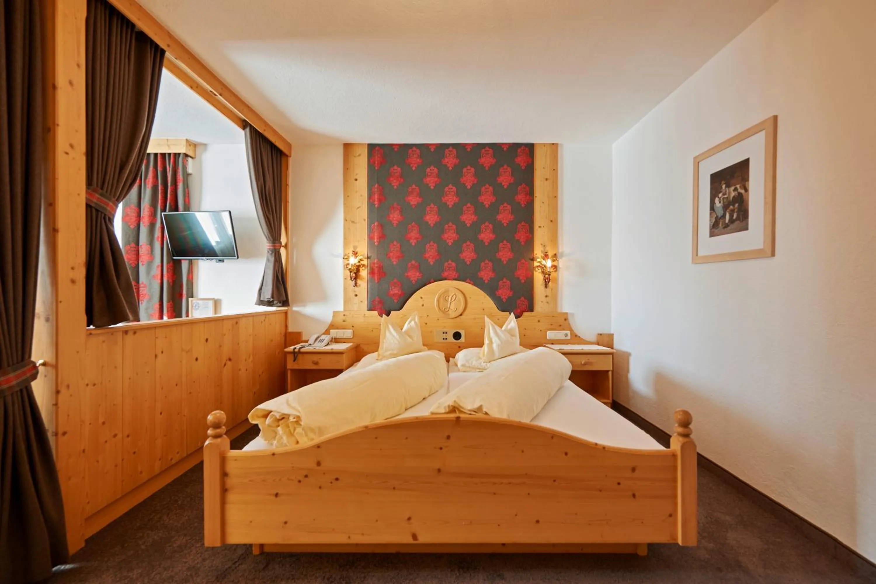 Bed in Alpenhotel Laurin