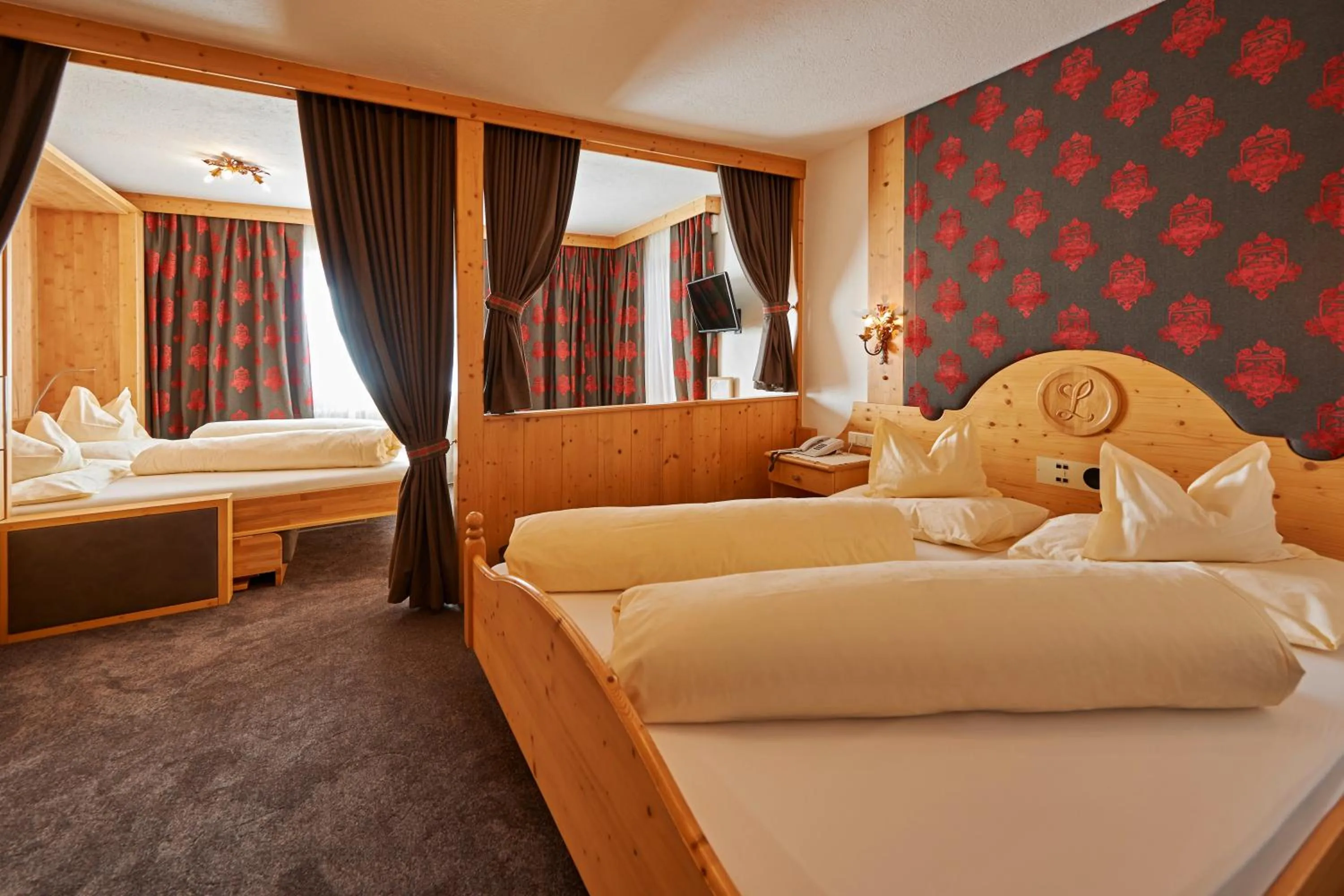 Bed in Alpenhotel Laurin