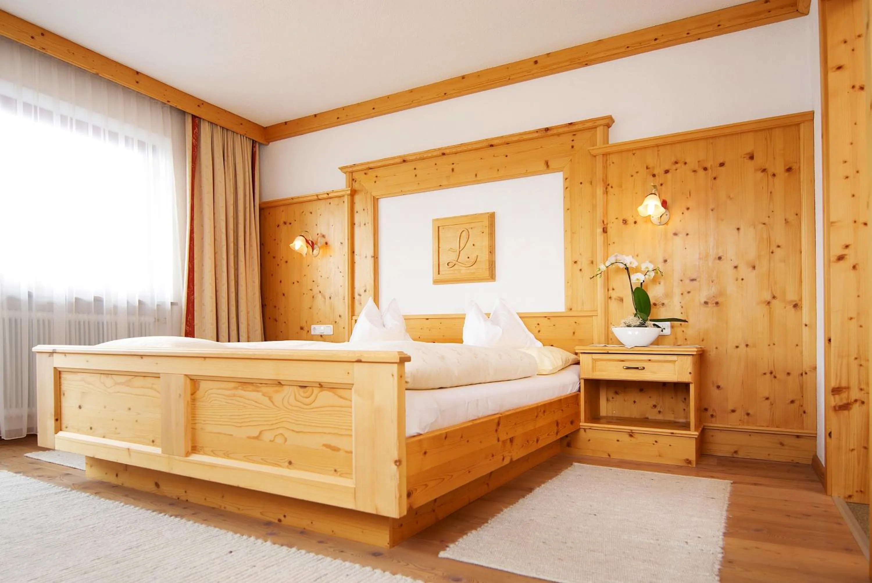 Bed in Alpenhotel Laurin